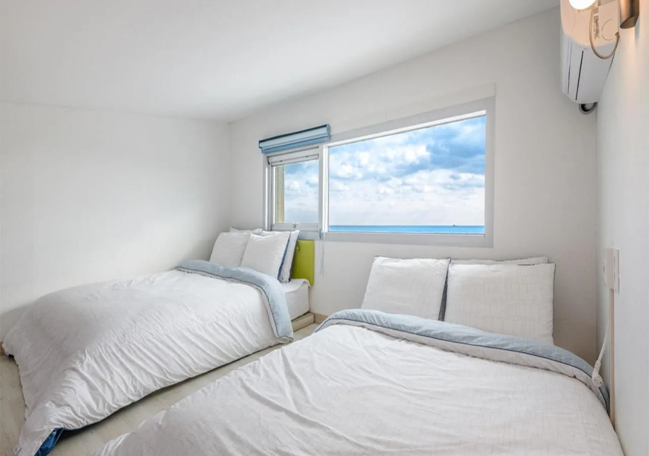 Bedroom, Bed in Jeju Turning point Pension