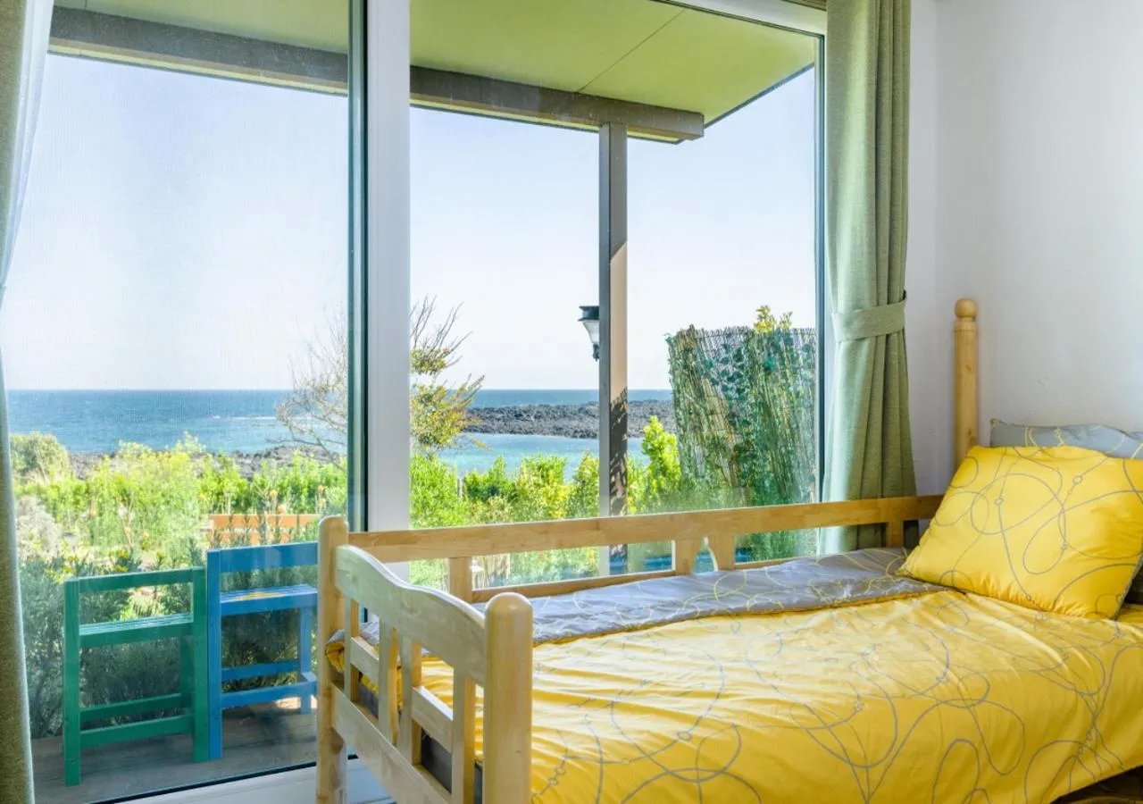 Balcony/Terrace, Bed in Jeju Turning point Pension