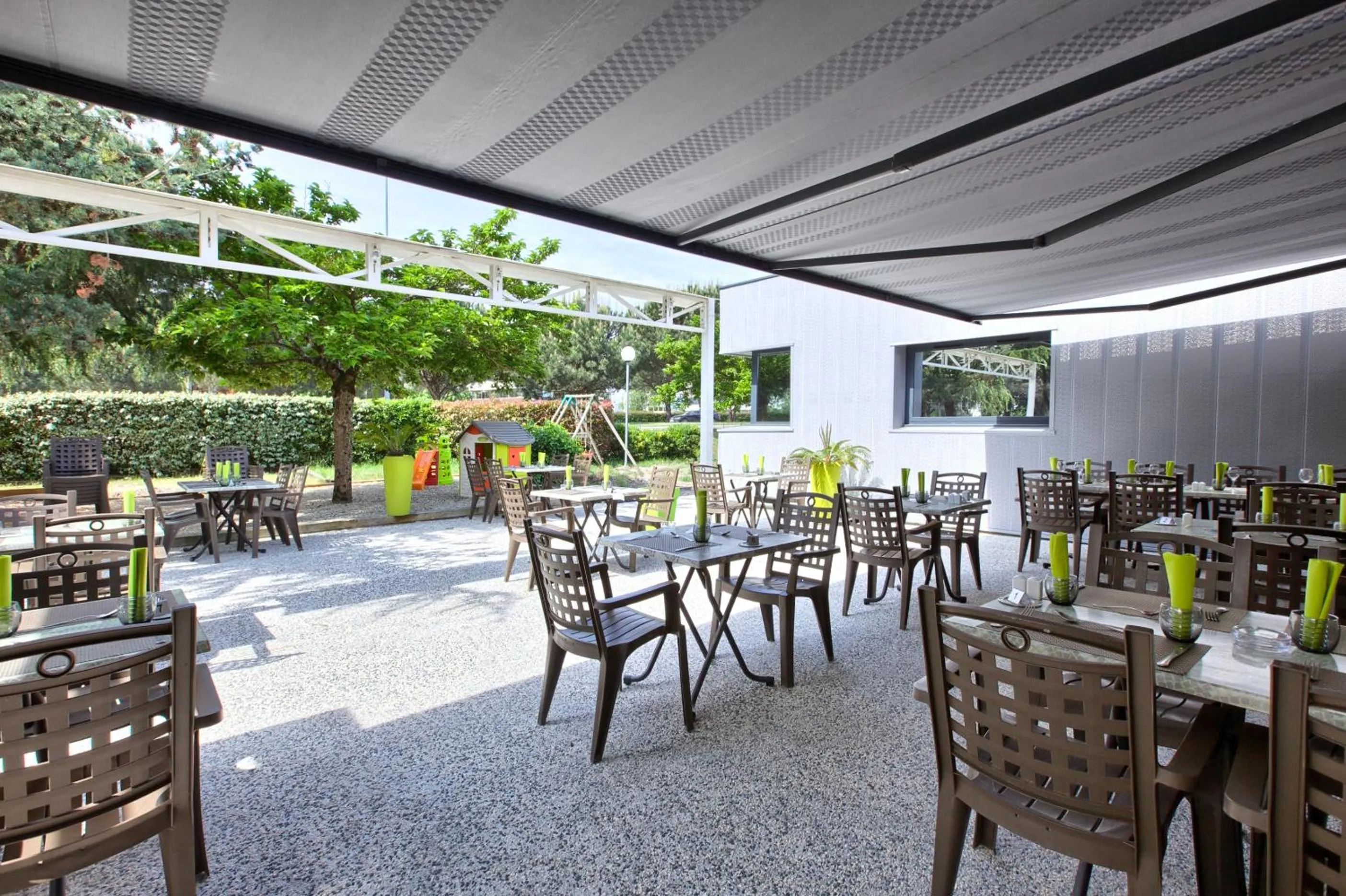 Patio in Logis Hotel Restaurant & SPA Au Comte d'Ornon