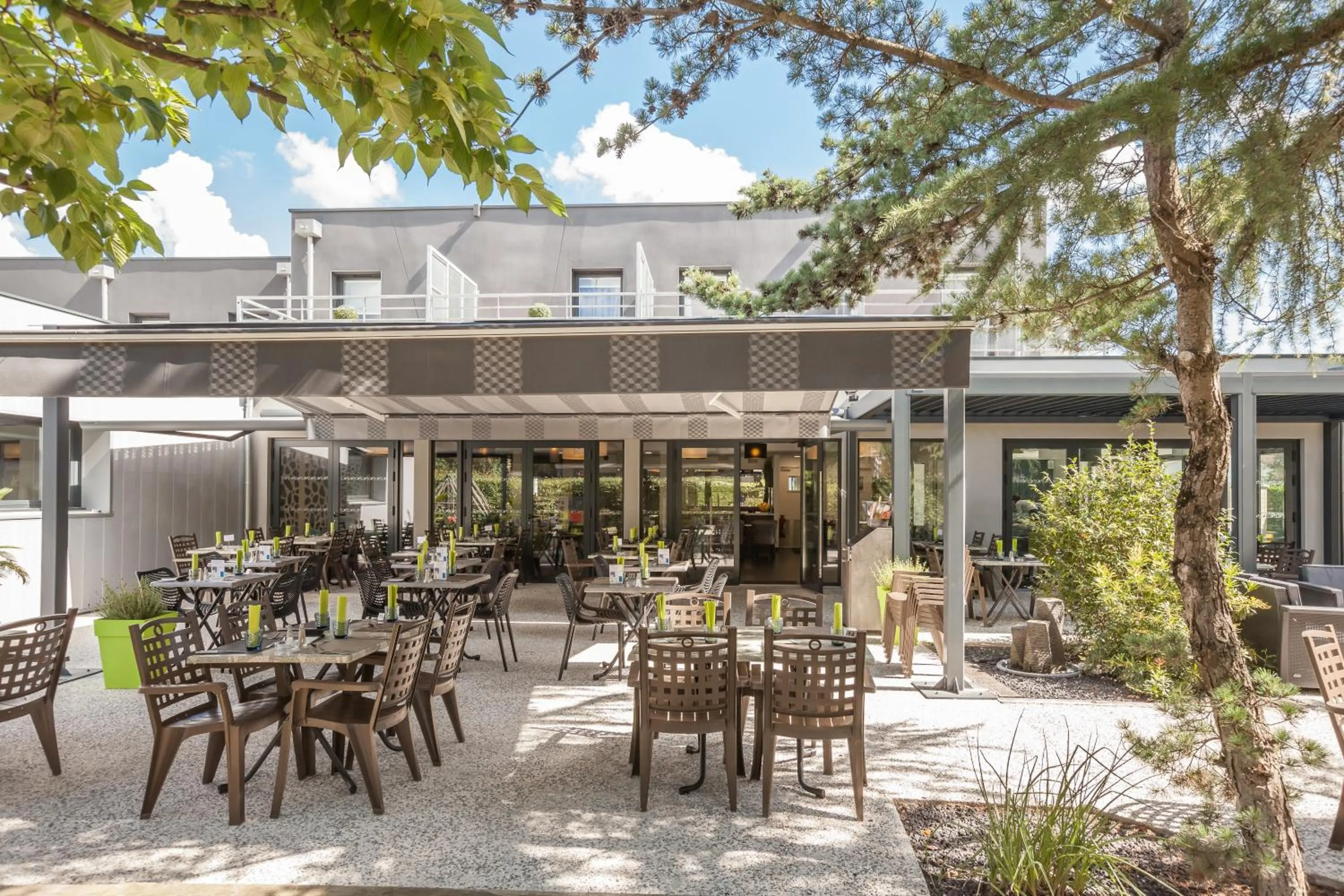 Patio in Logis Hotel Restaurant & SPA Au Comte d'Ornon