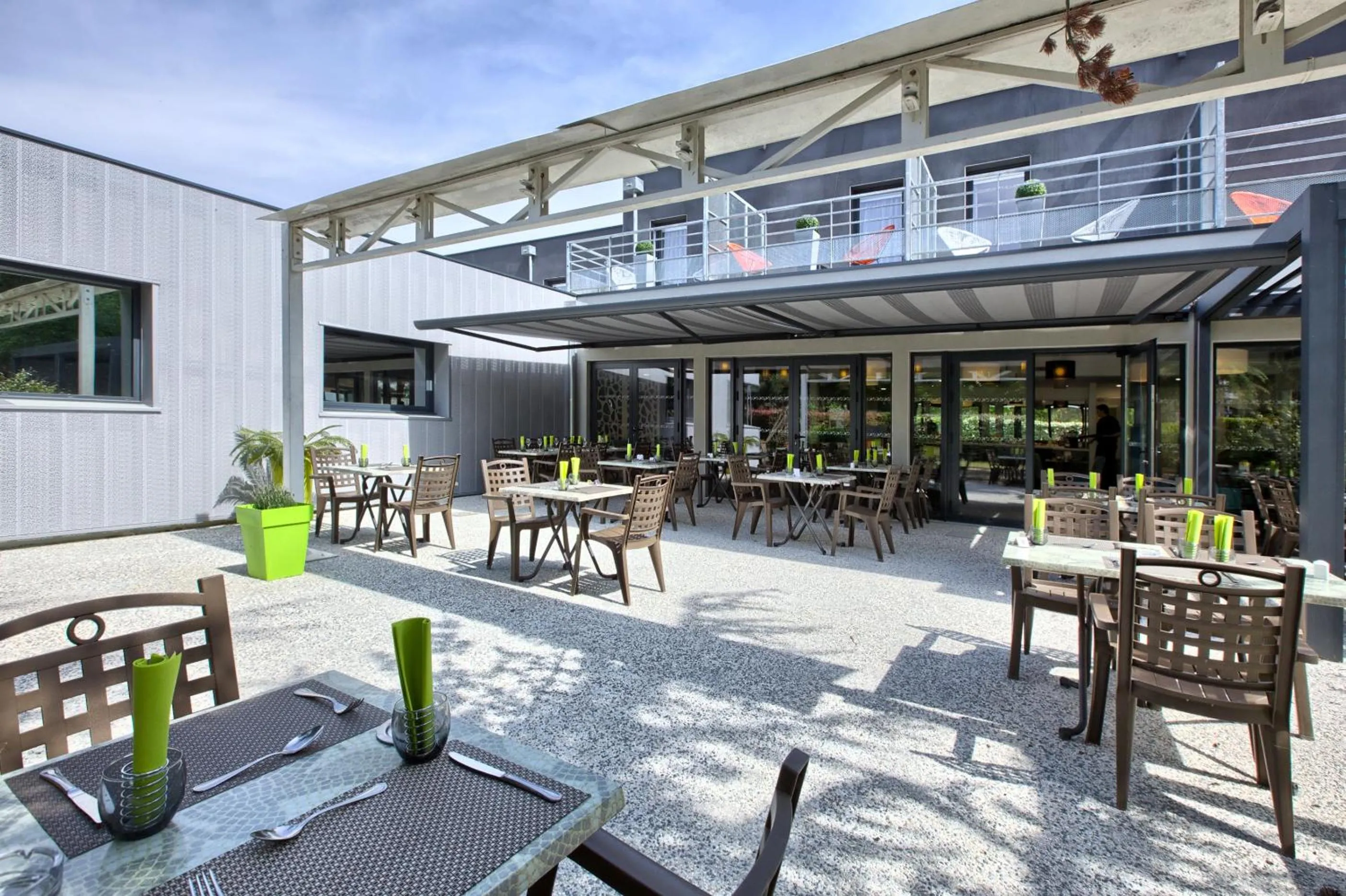Patio in Logis Hotel Restaurant & SPA Au Comte d'Ornon