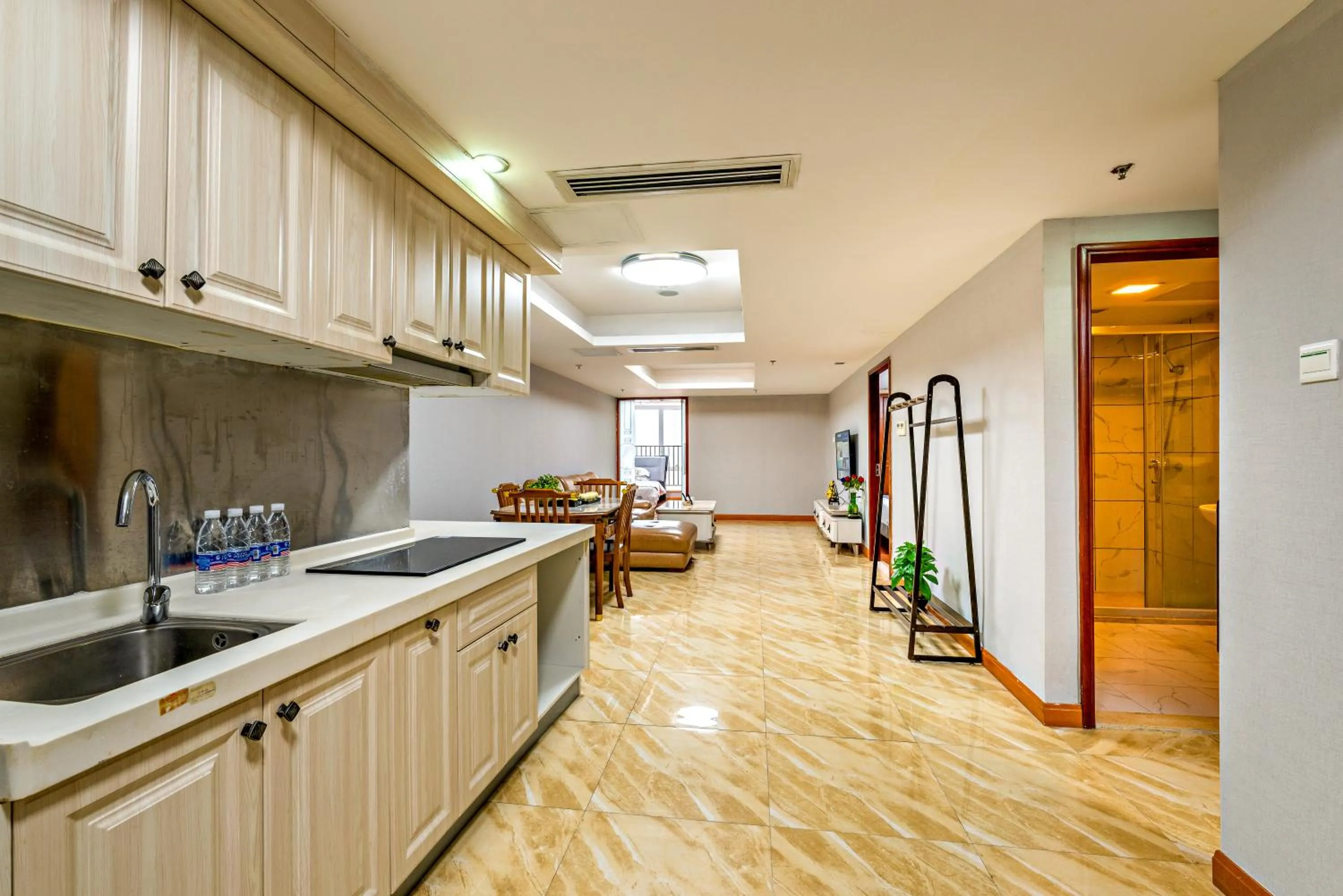 Kitchen or kitchenette in Guangzhou Manhattan International Apartment Zhengjia Free bus services are provided for the first and second phases