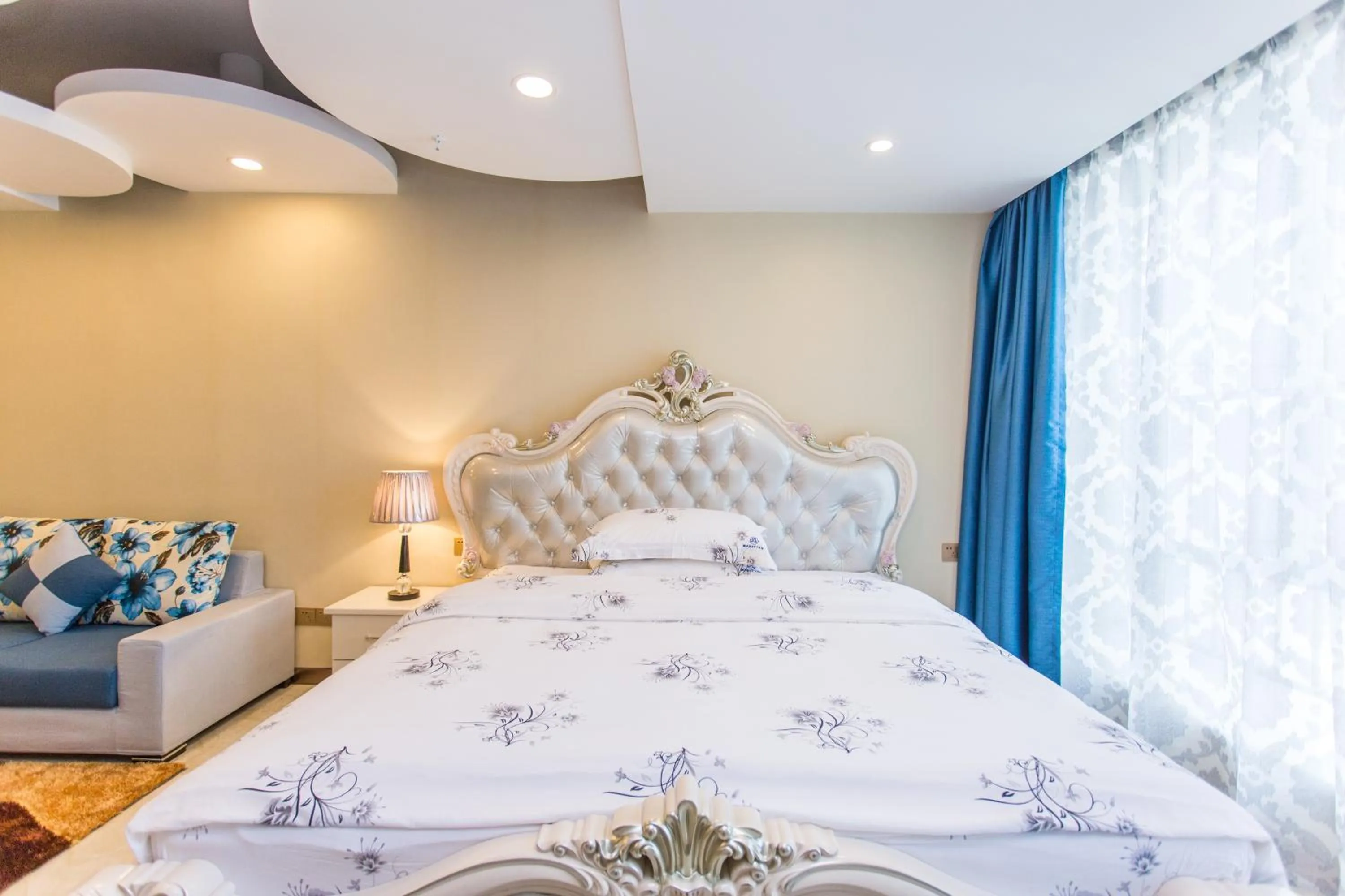 Bed in Guangzhou Manhattan International Apartment Zhengjia Free bus services are provided for the first and second phases