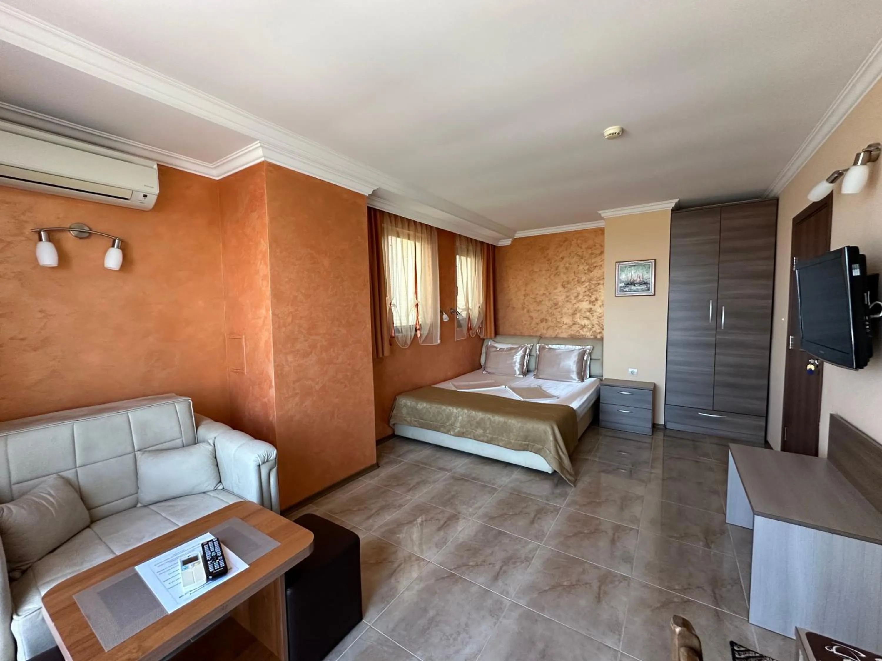 Bed in Family Hotel Radiana