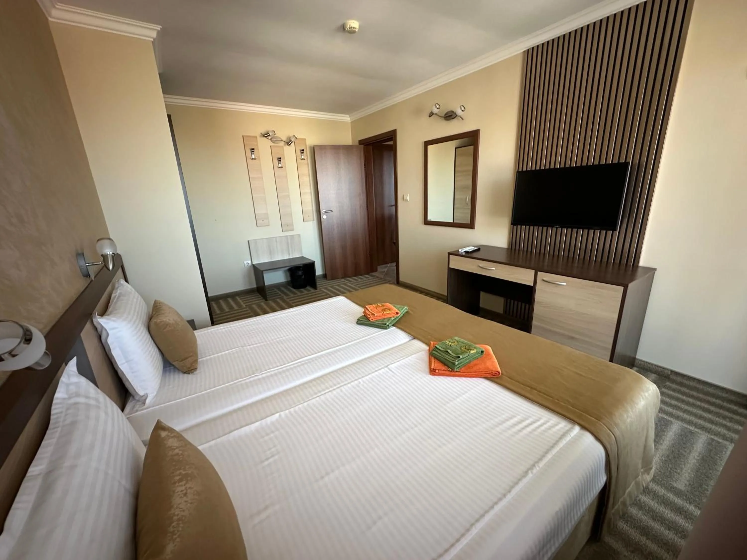 Bed in Family Hotel Radiana