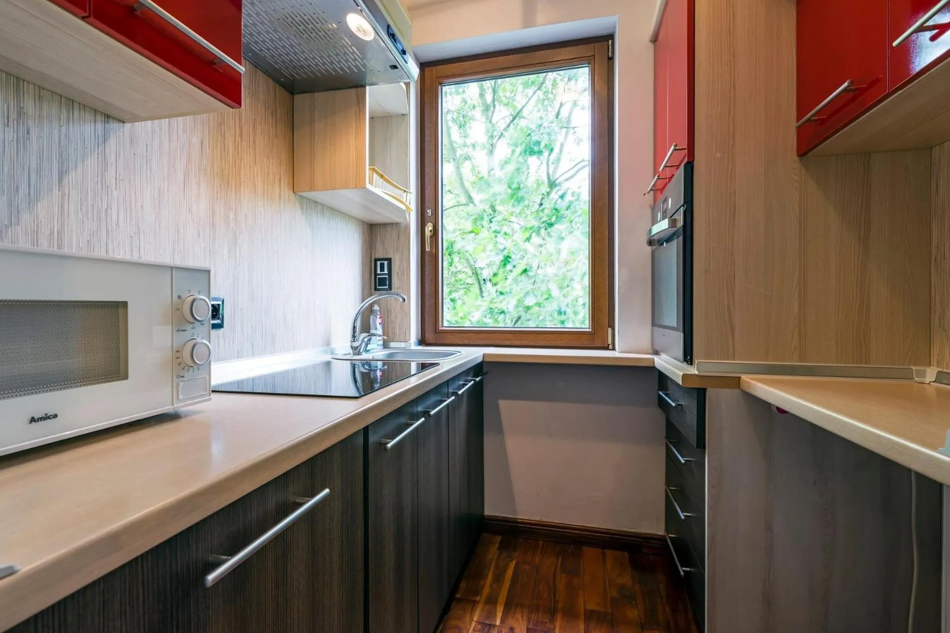 kitchen in Mala Italia Apartments