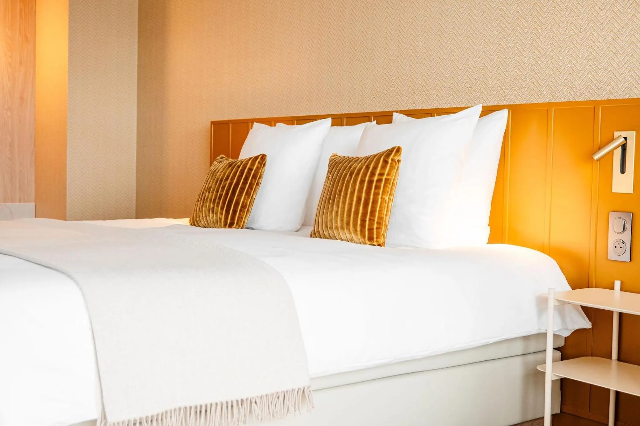 Bed in Van der Valk Hotel Paris CDG Airport