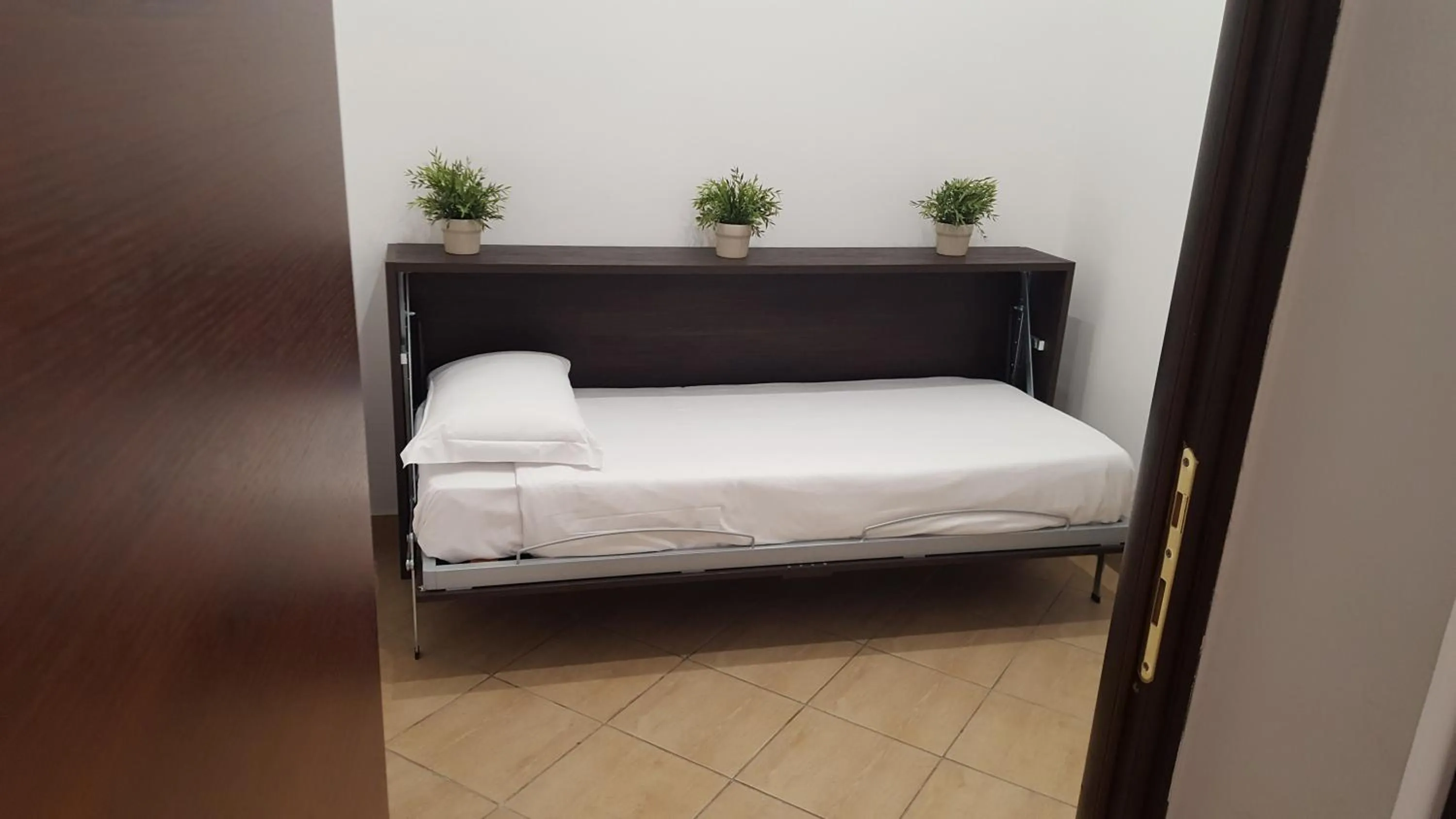 Bed in Una Finestra su Monti