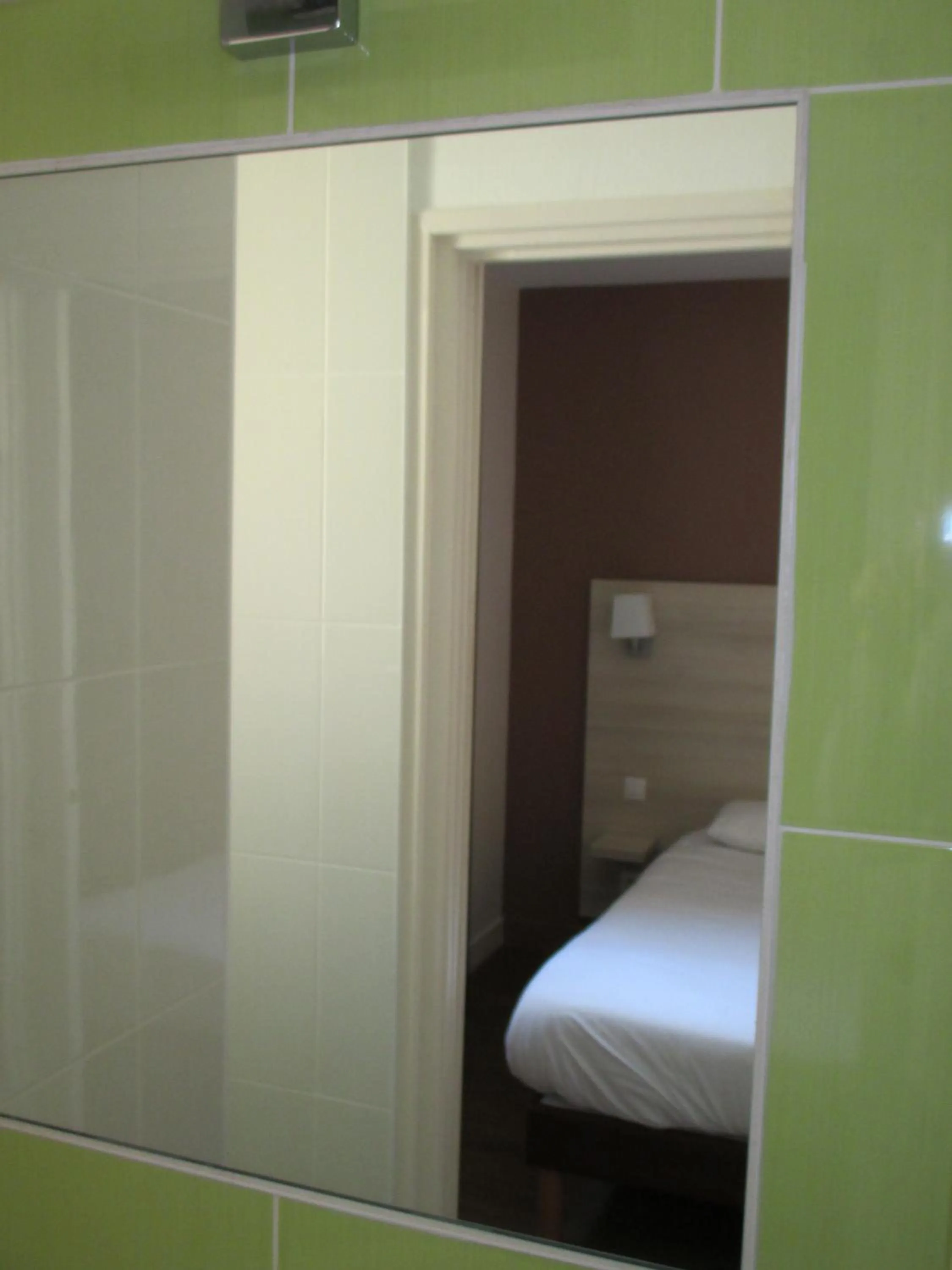 Decorative detail, Bed in Hôtel Montchapet Dijon Centre