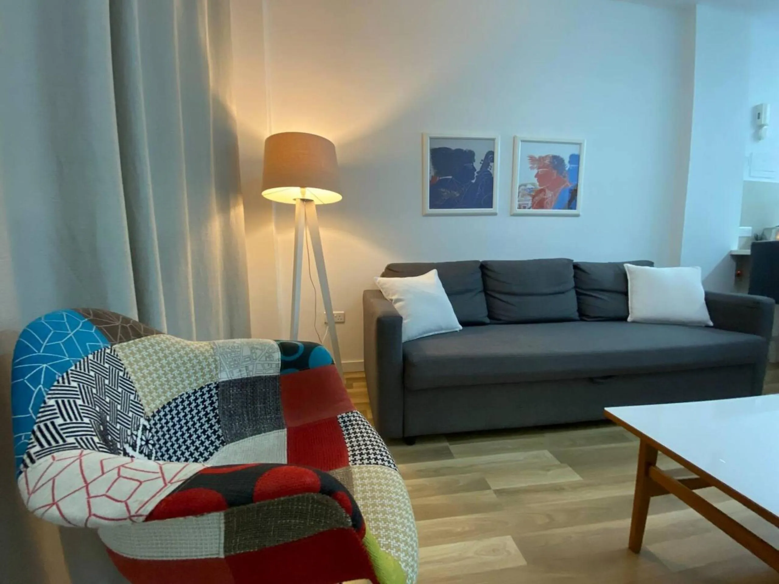 Living room in SeaBreeze City Center Flats by TrulyCyprus