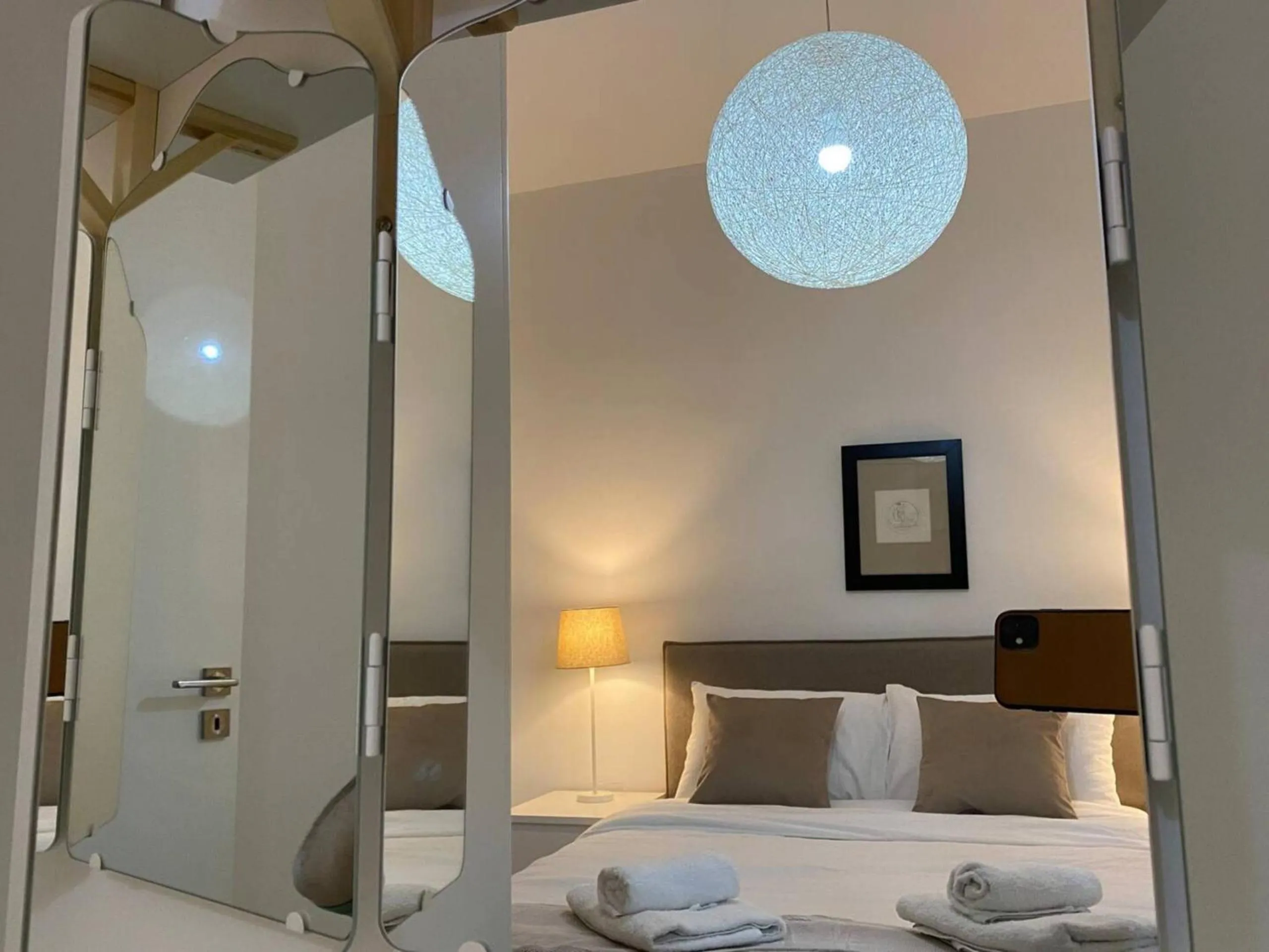 Bedroom, Bed in SeaBreeze City Center Flats by TrulyCyprus