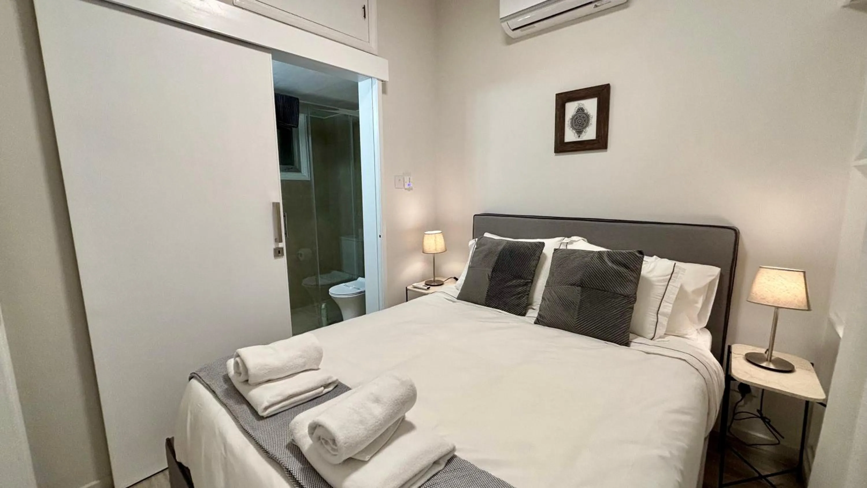 Bedroom, Bed in SeaBreeze City Center Flats by TrulyCyprus