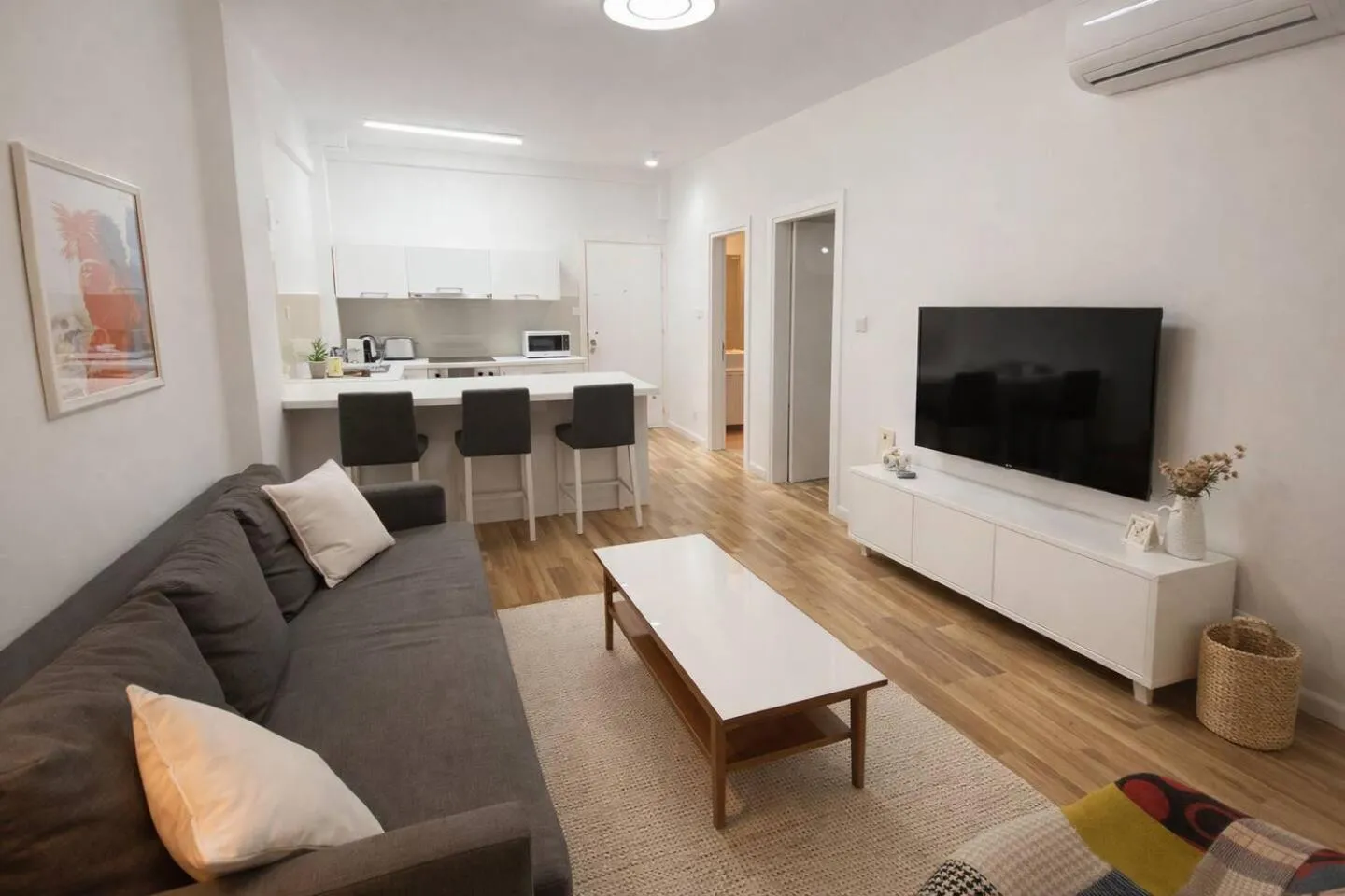 Living room in SeaBreeze City Center Flats by TrulyCyprus