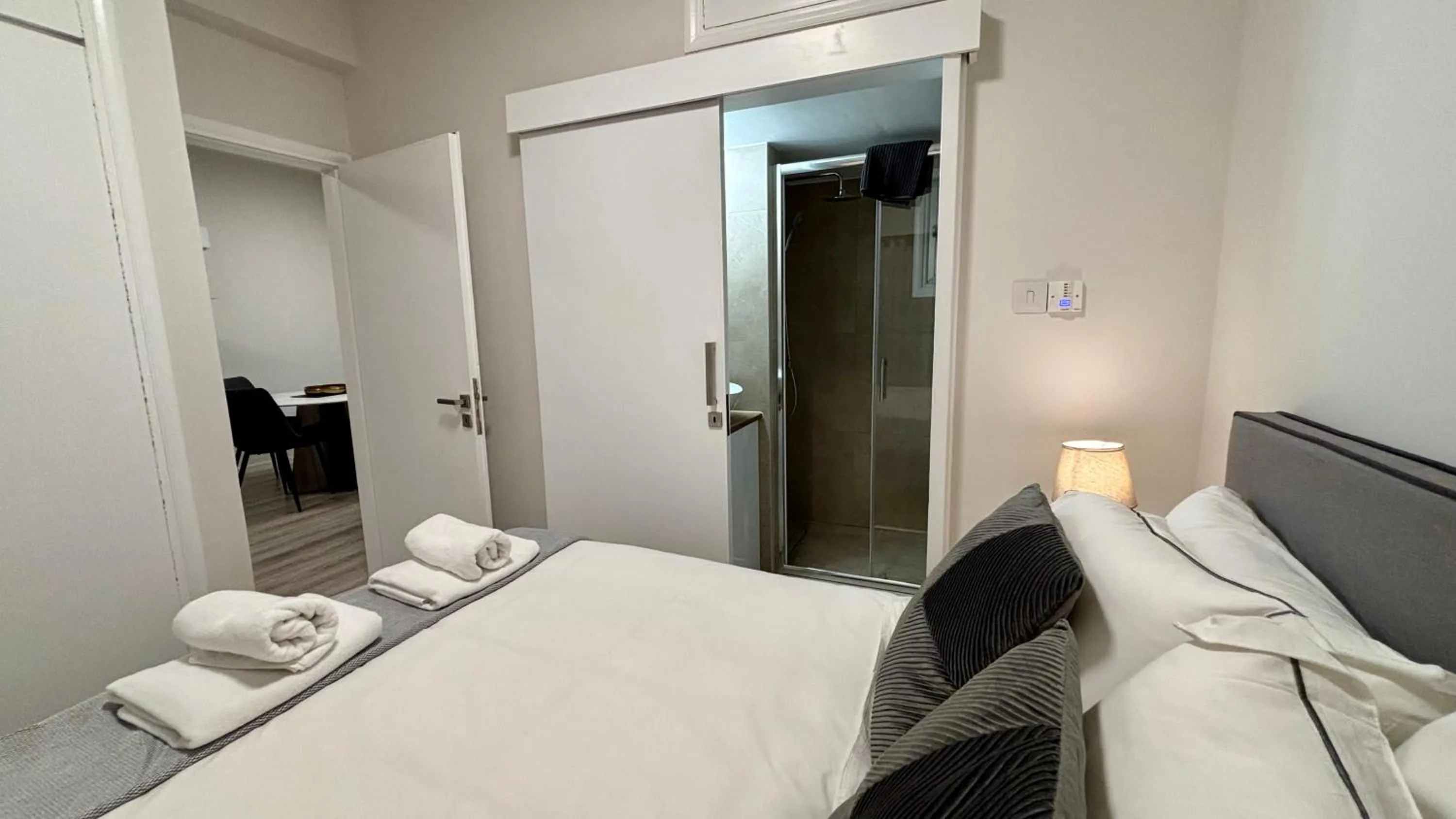 Bedroom, Bed in SeaBreeze City Center Flats by TrulyCyprus