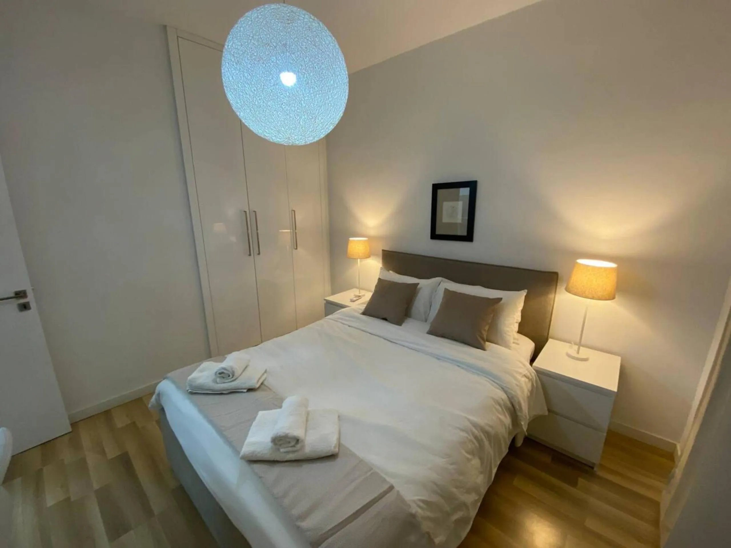 Bedroom, Bed in SeaBreeze City Center Flats by TrulyCyprus