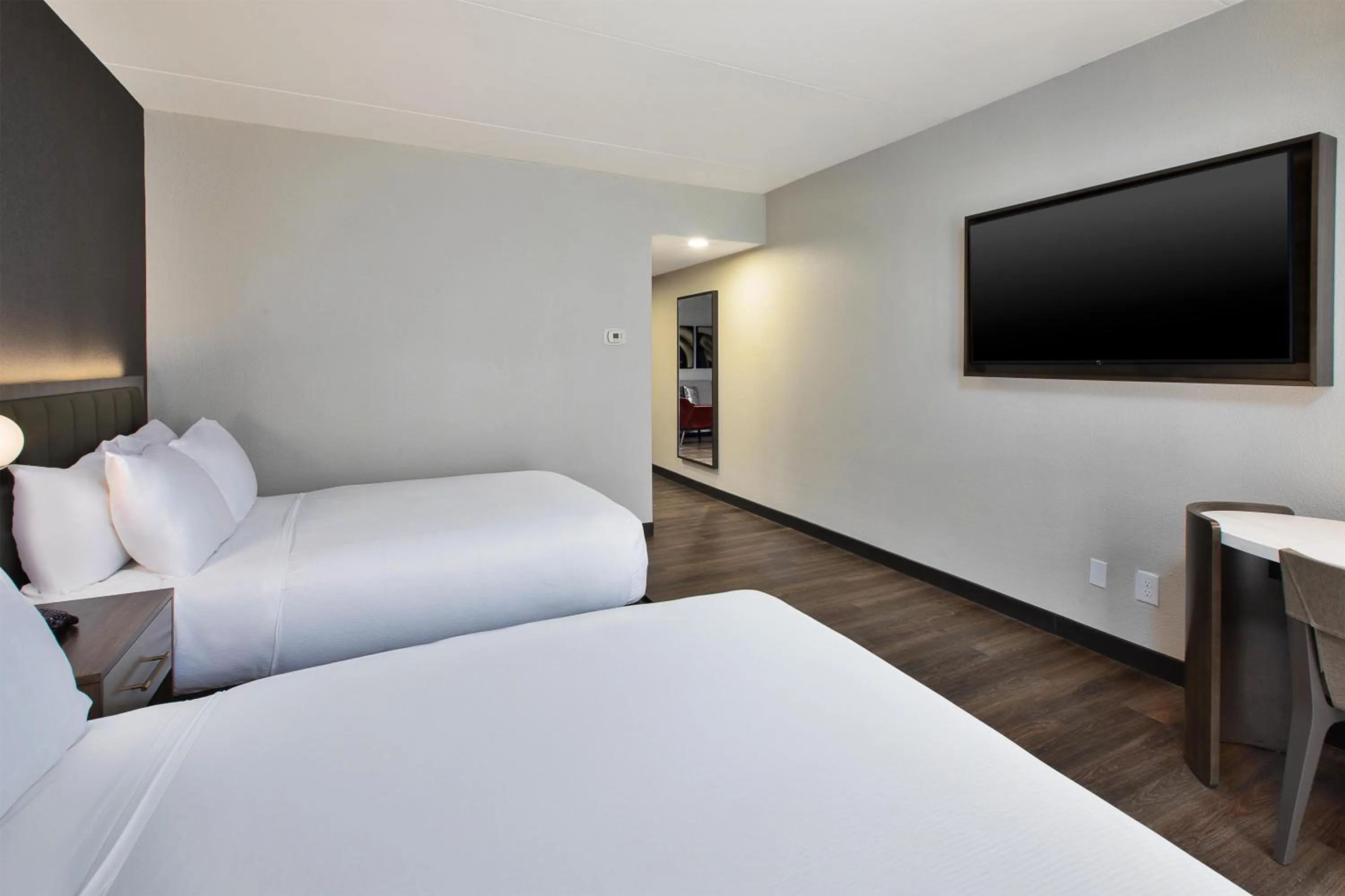 Bed in DoubleTree by Hilton Hotel Detroit Novi