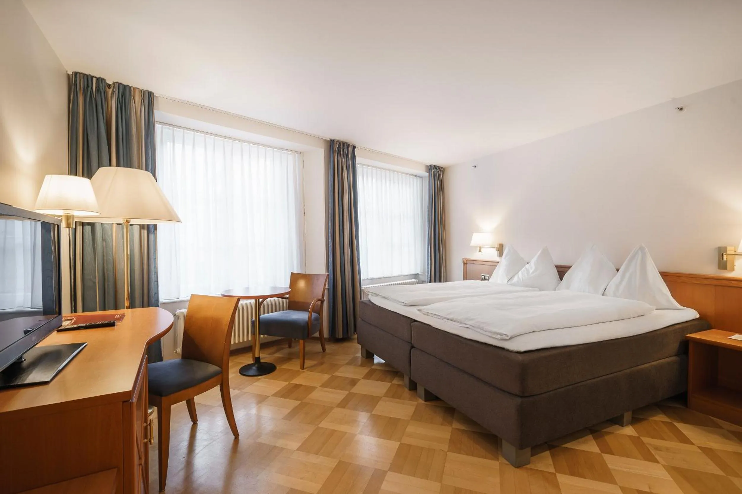 Bed in BLUME Baden Hotel & Restaurant