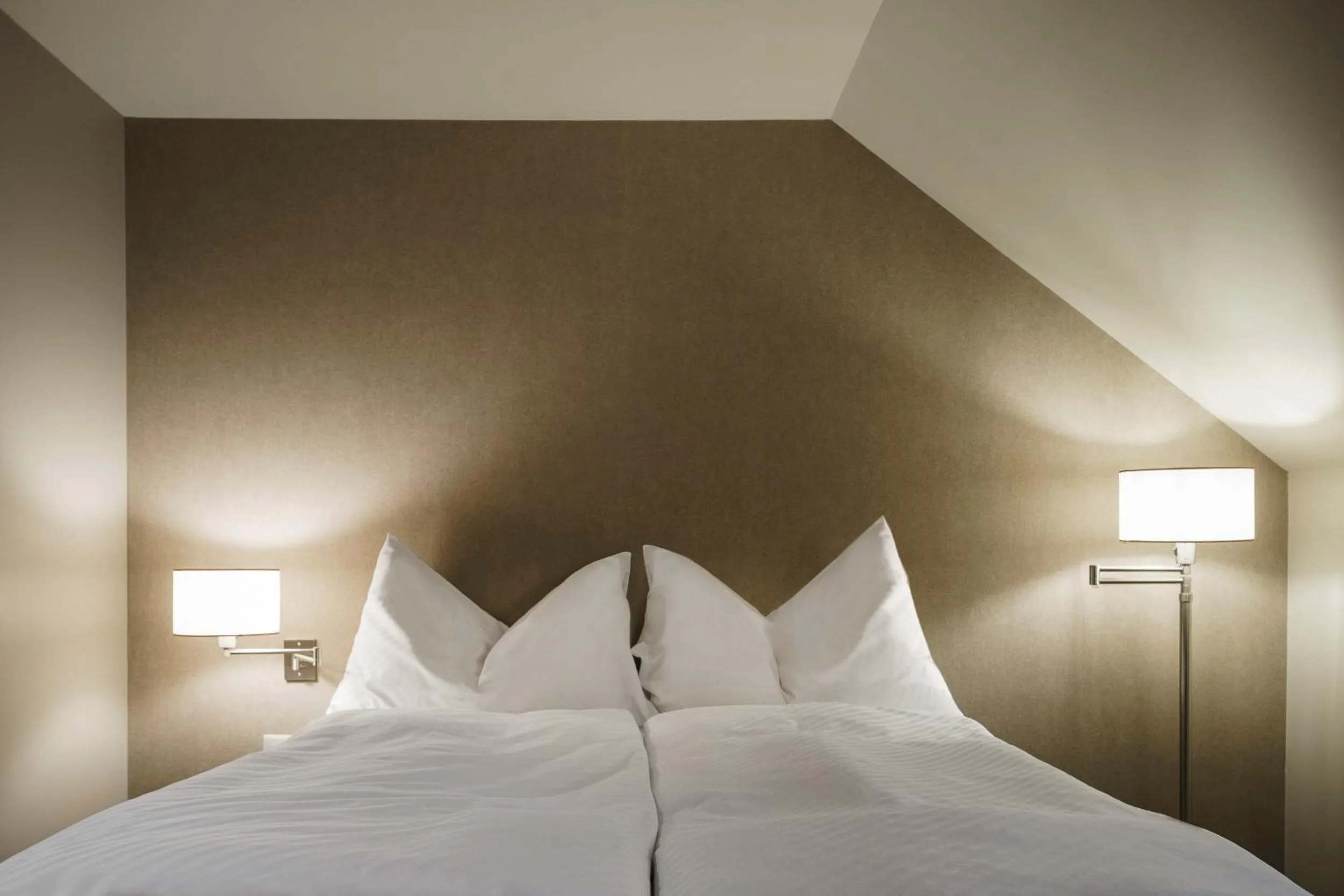 Bed in BLUME Baden Hotel & Restaurant