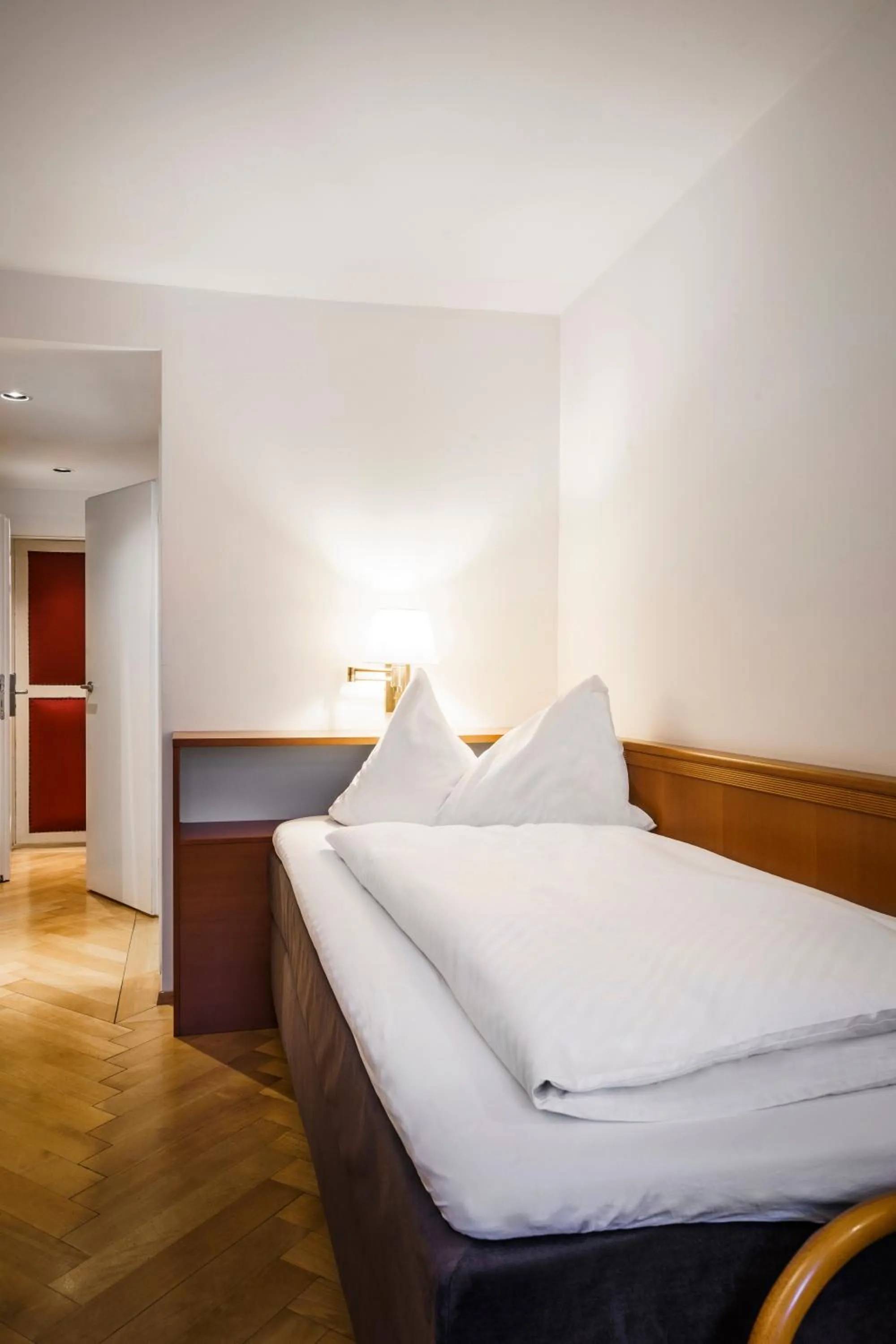 Bed in BLUME Baden Hotel & Restaurant