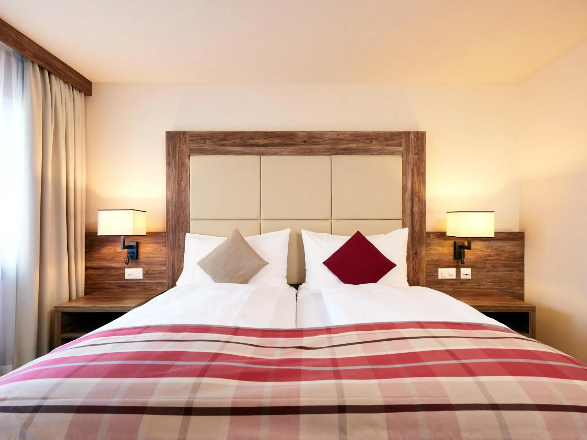 Bedroom, Bed in Hotel Ambassador Zermatt