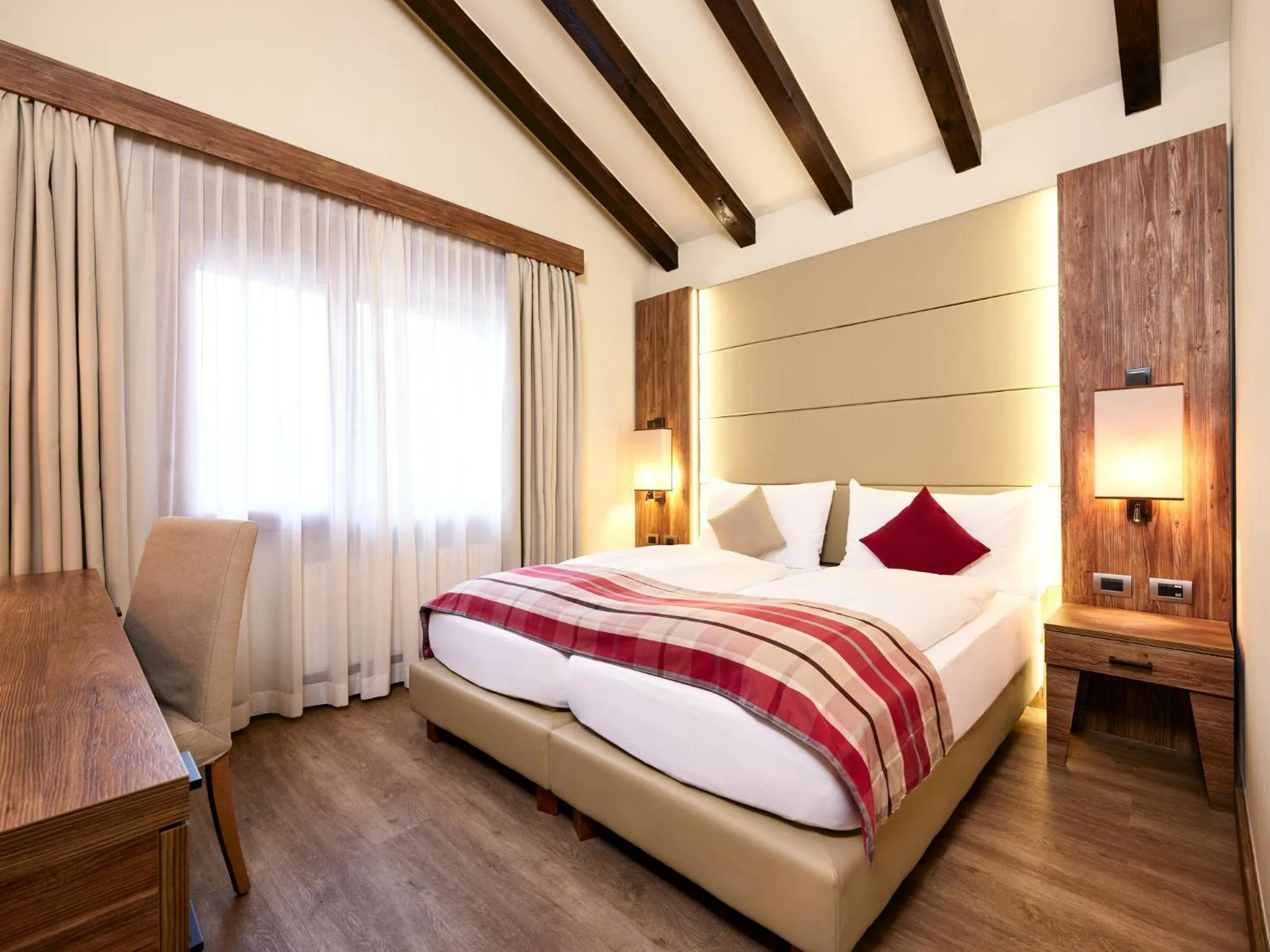 Bedroom, Bed in Hotel Ambassador Zermatt