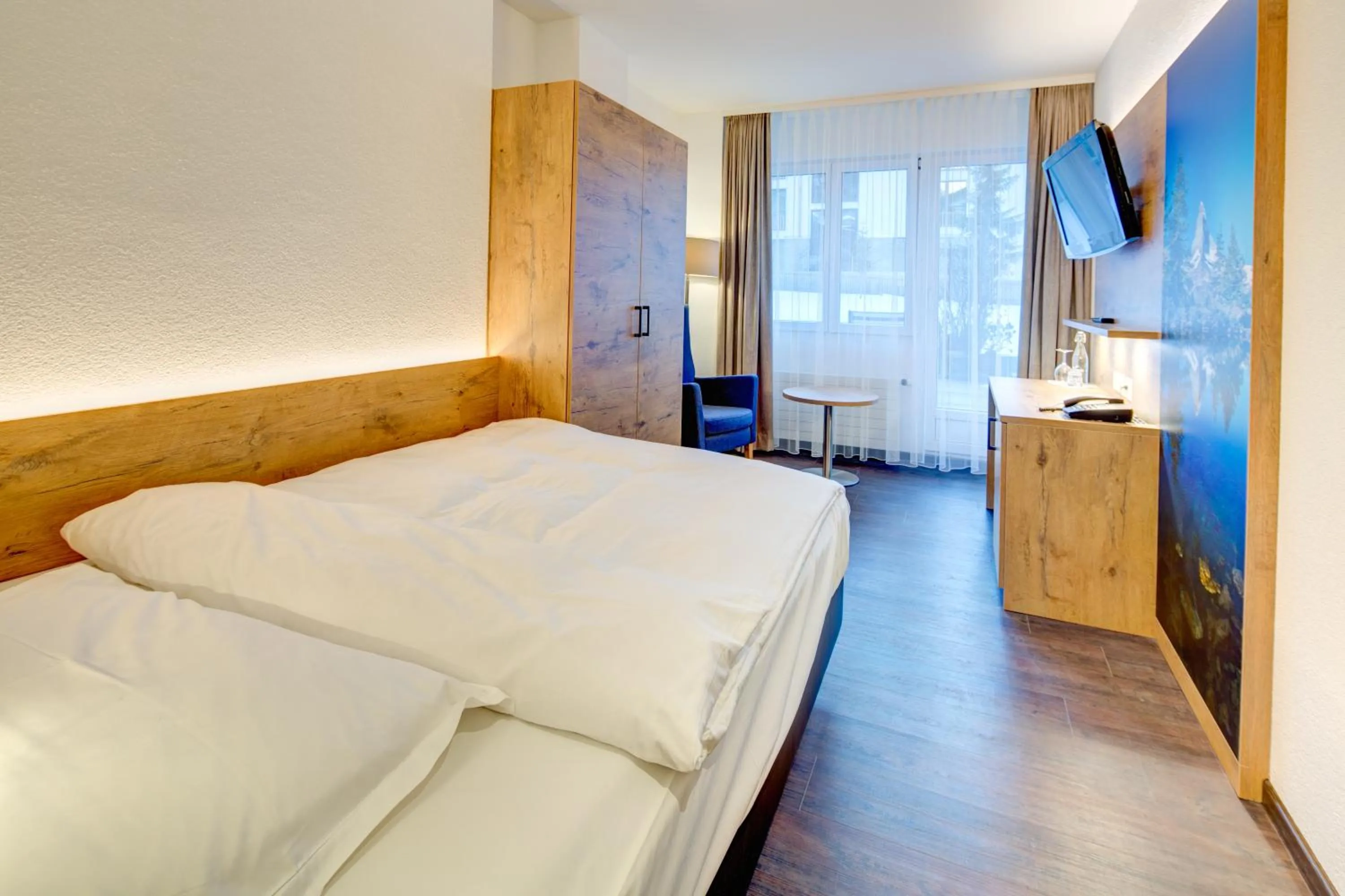 Bedroom, Bed in Alpen Resort & Spa