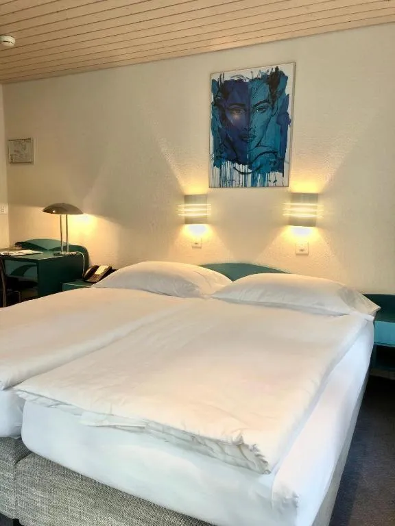 Bed in Hotel Châlet Du Lac