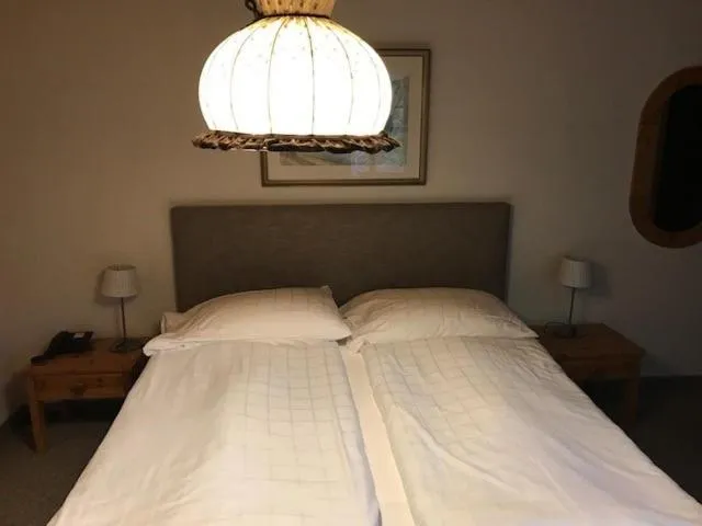 Bed in Hotel Châlet Du Lac