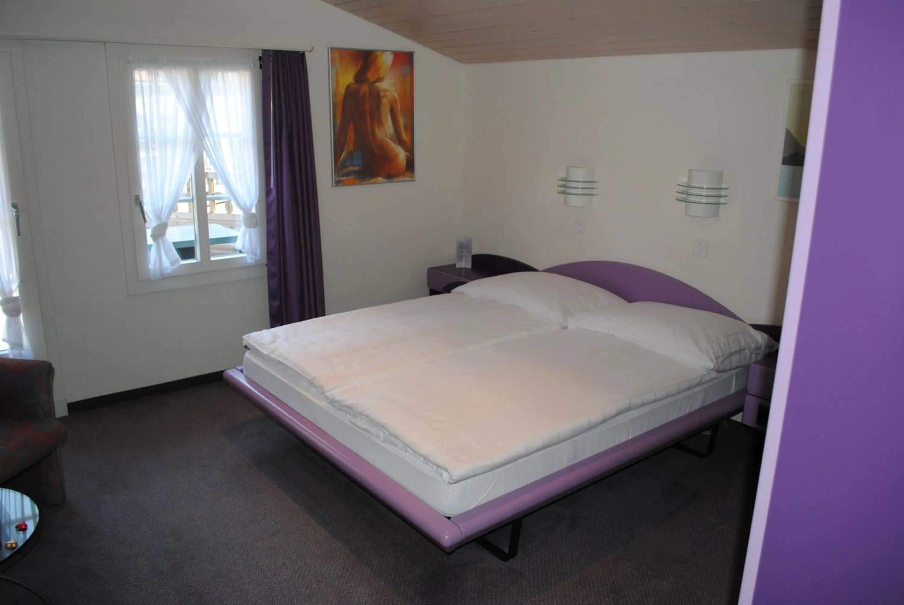 Bed in Hotel Châlet Du Lac