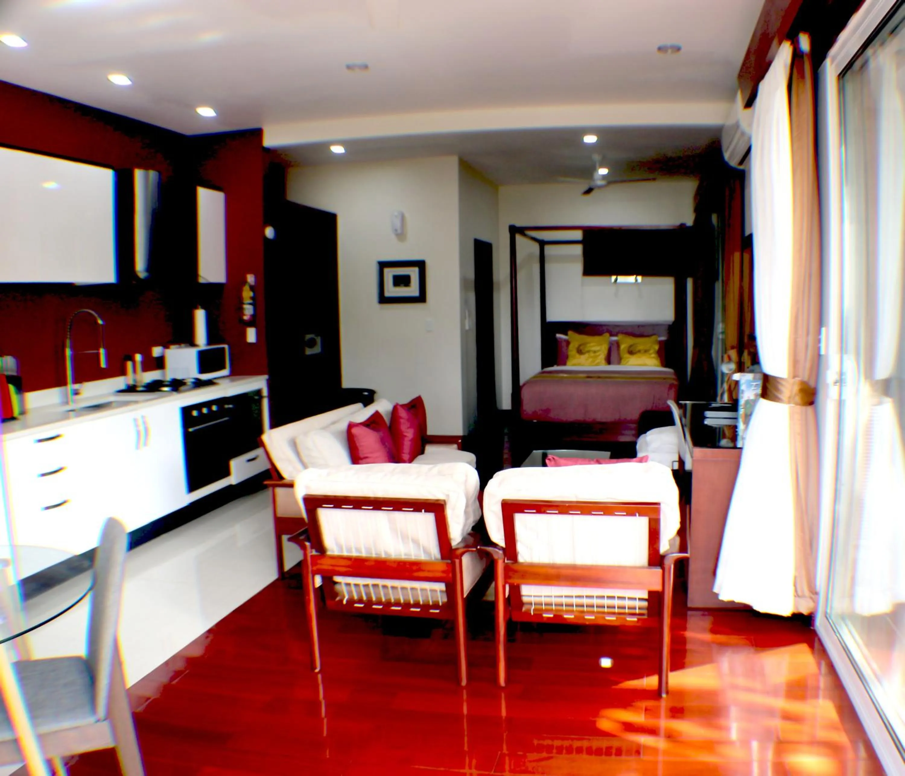 Bed in Kia Orana Villas and Spa