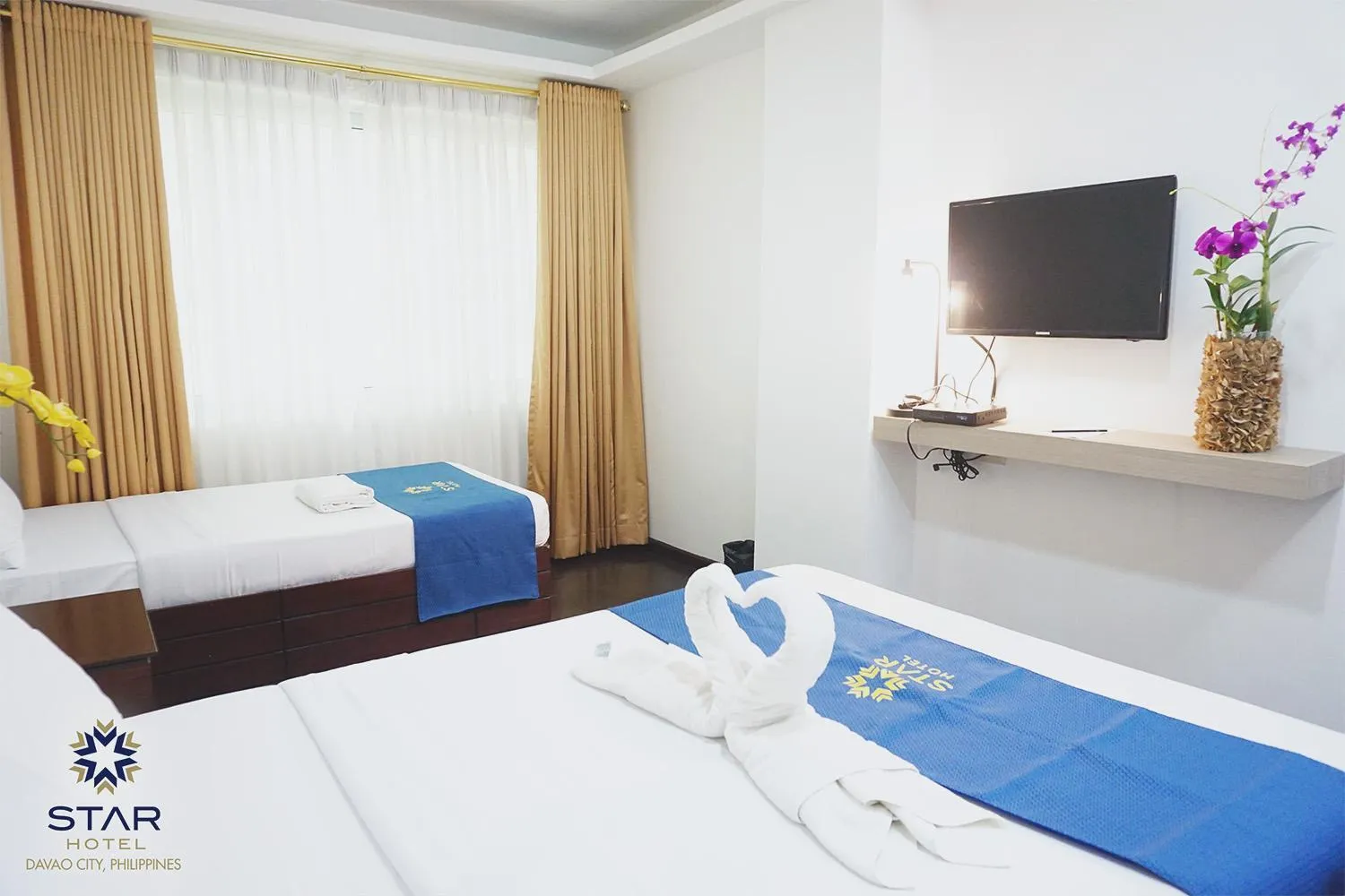 Photo of the whole room, Bed in Star Hotel