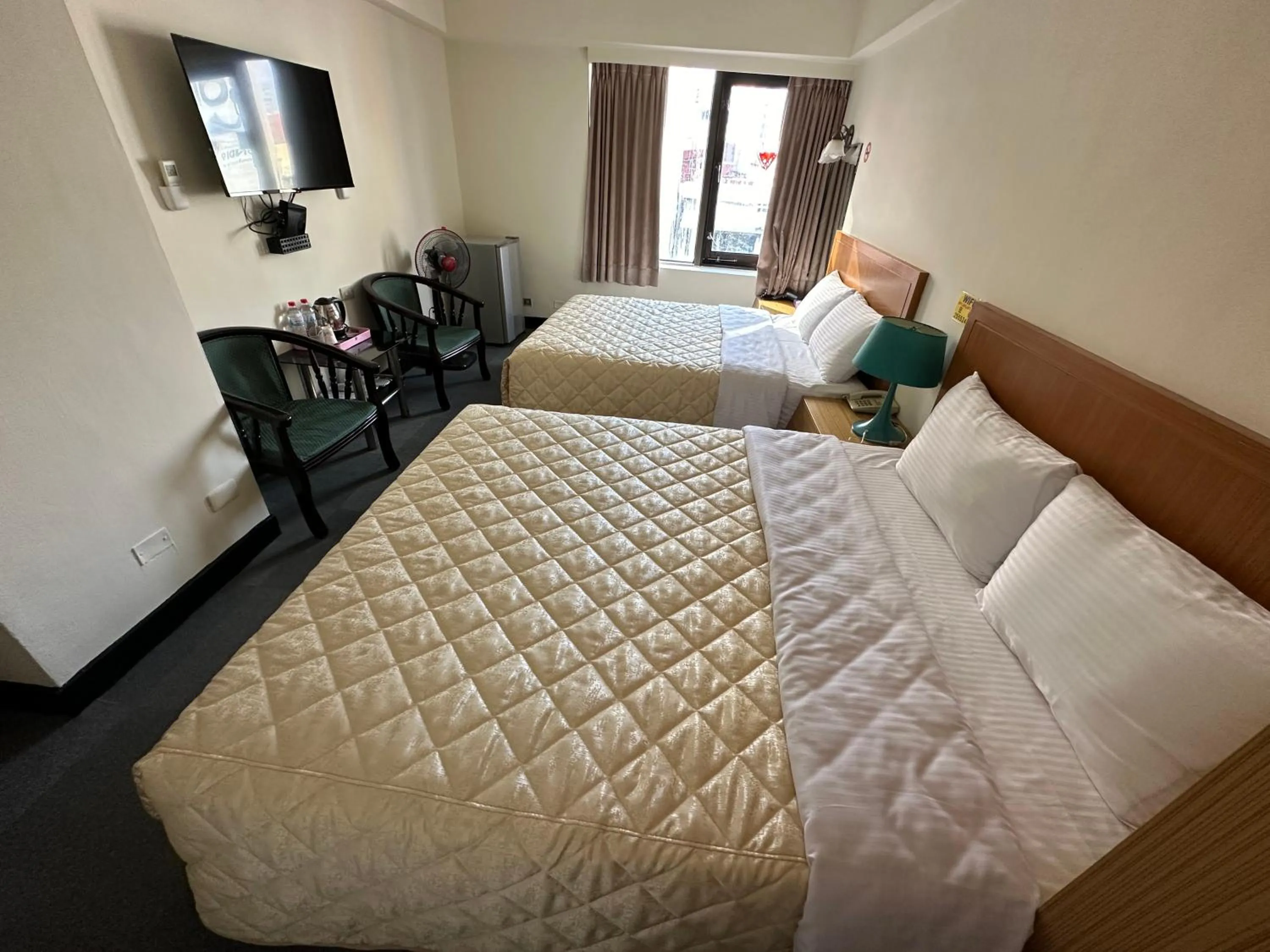 Bed in Chian Huei Business Hotel