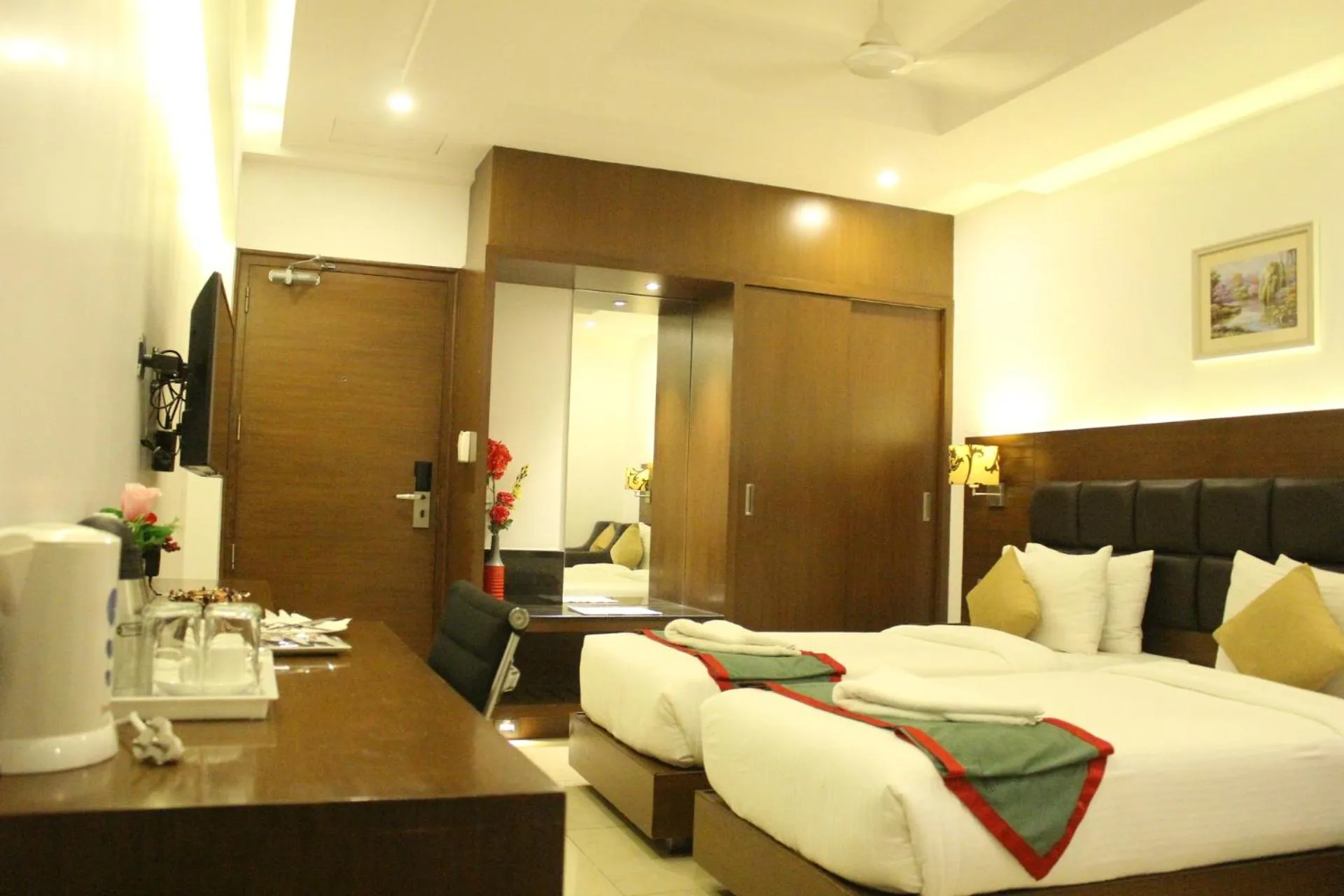 Living room, Bed in Hotel Nk Grand Park Airport Hotel