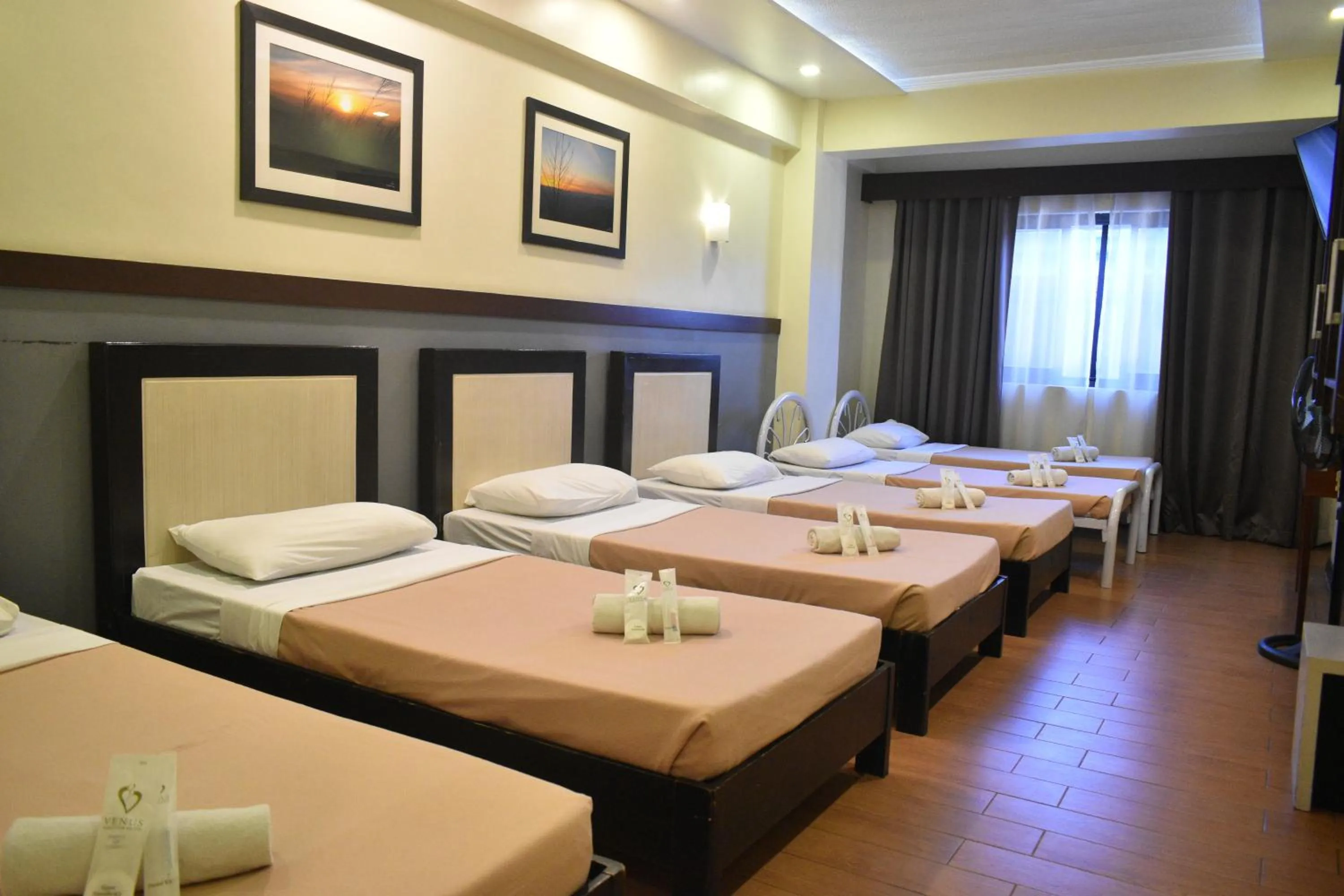 Bed in Venus Parkview Hotel