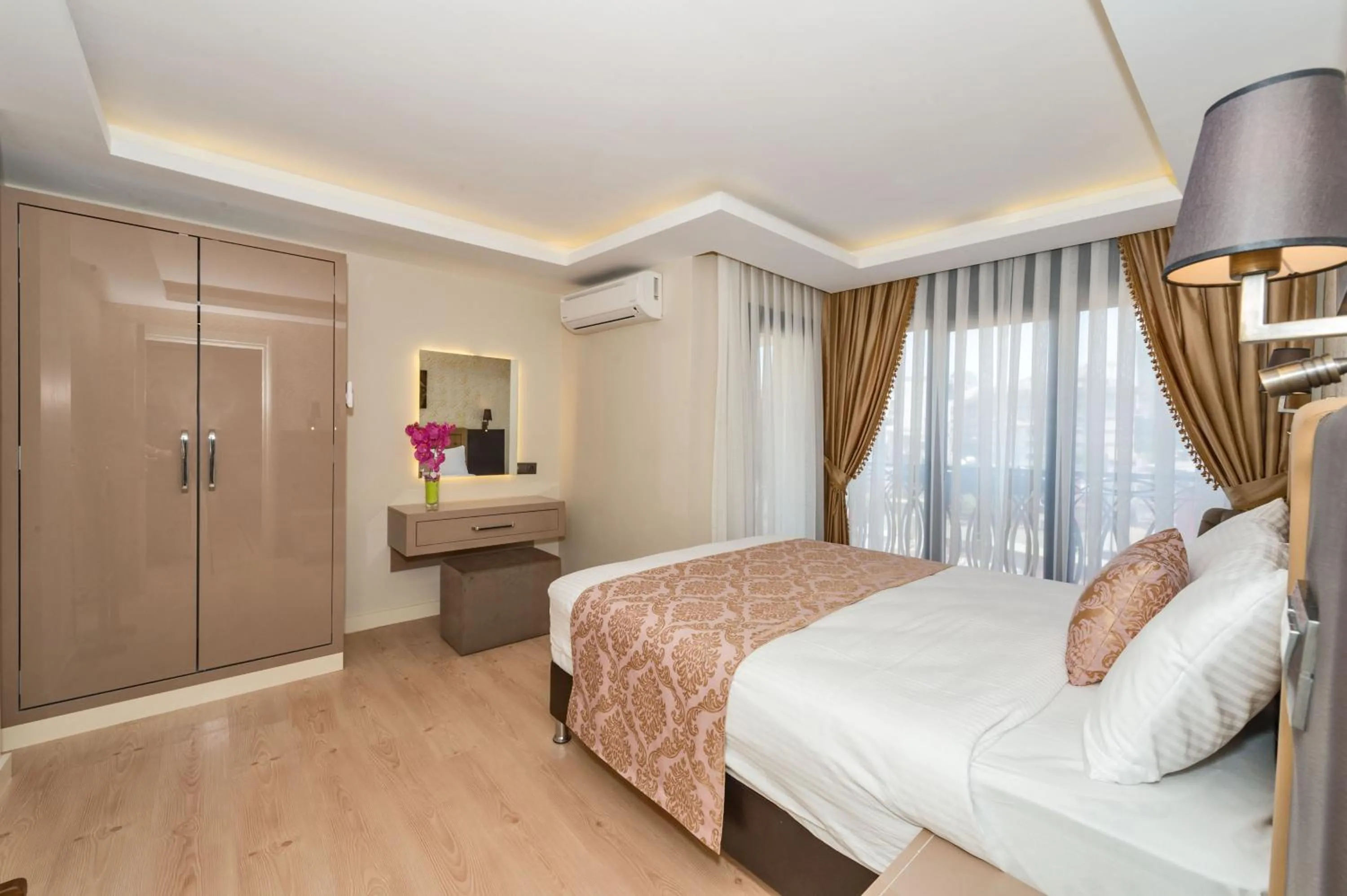 Photo of the whole room, Bed in Gen Suites