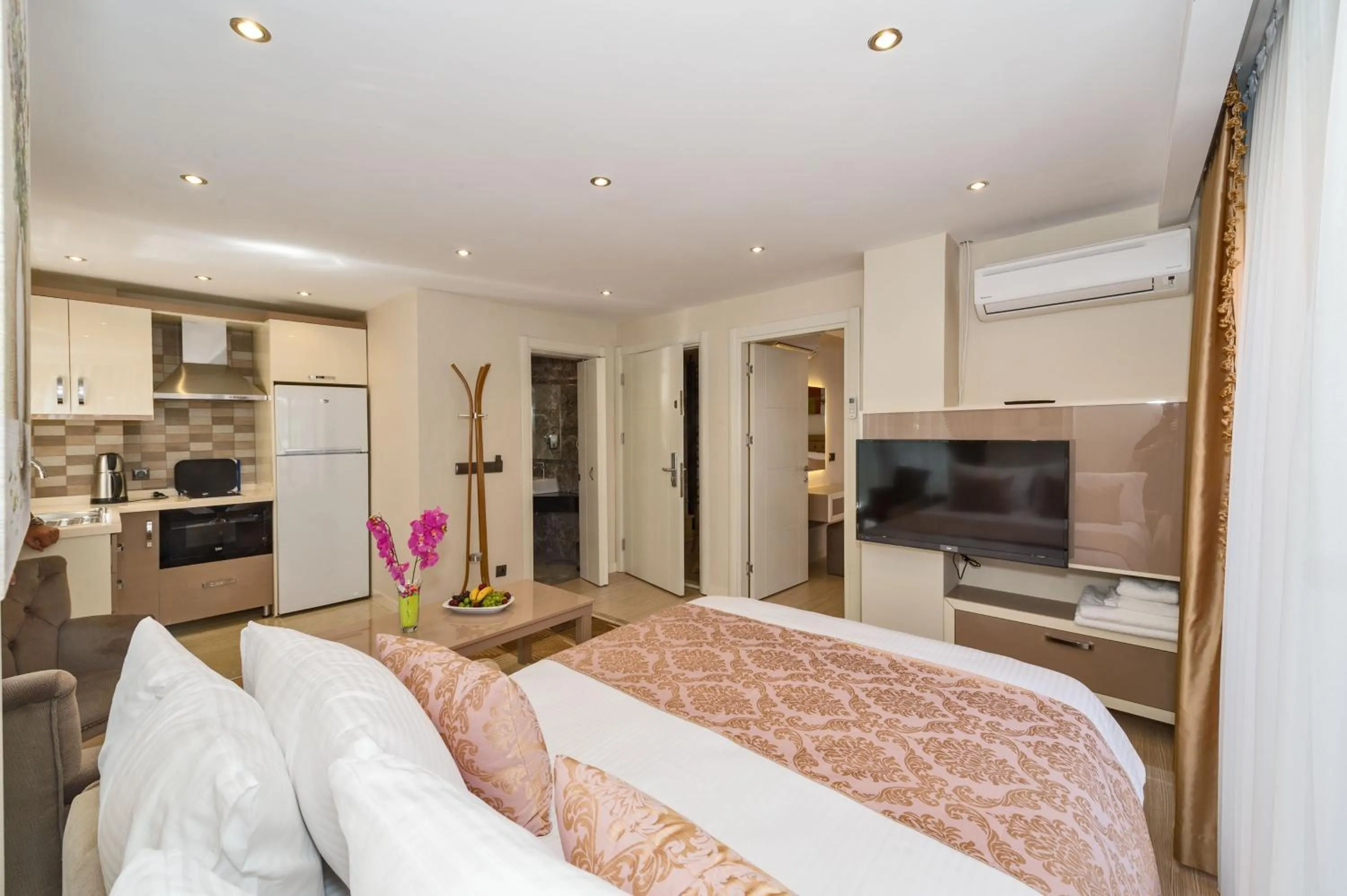 Photo of the whole room, Bed in Gen Suites