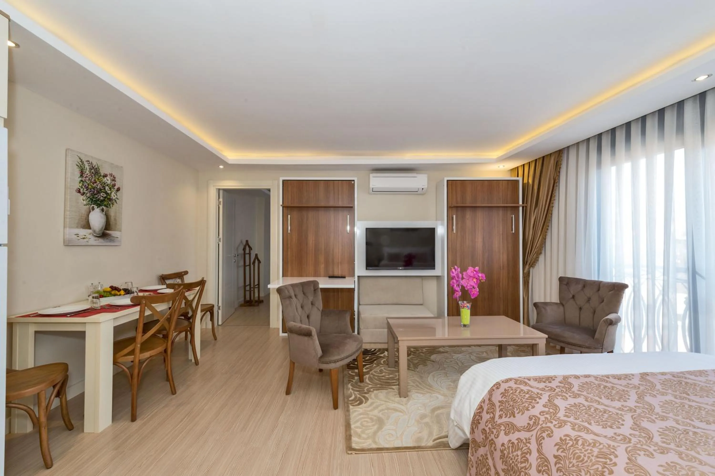 Living room, Bed in Gen Suites