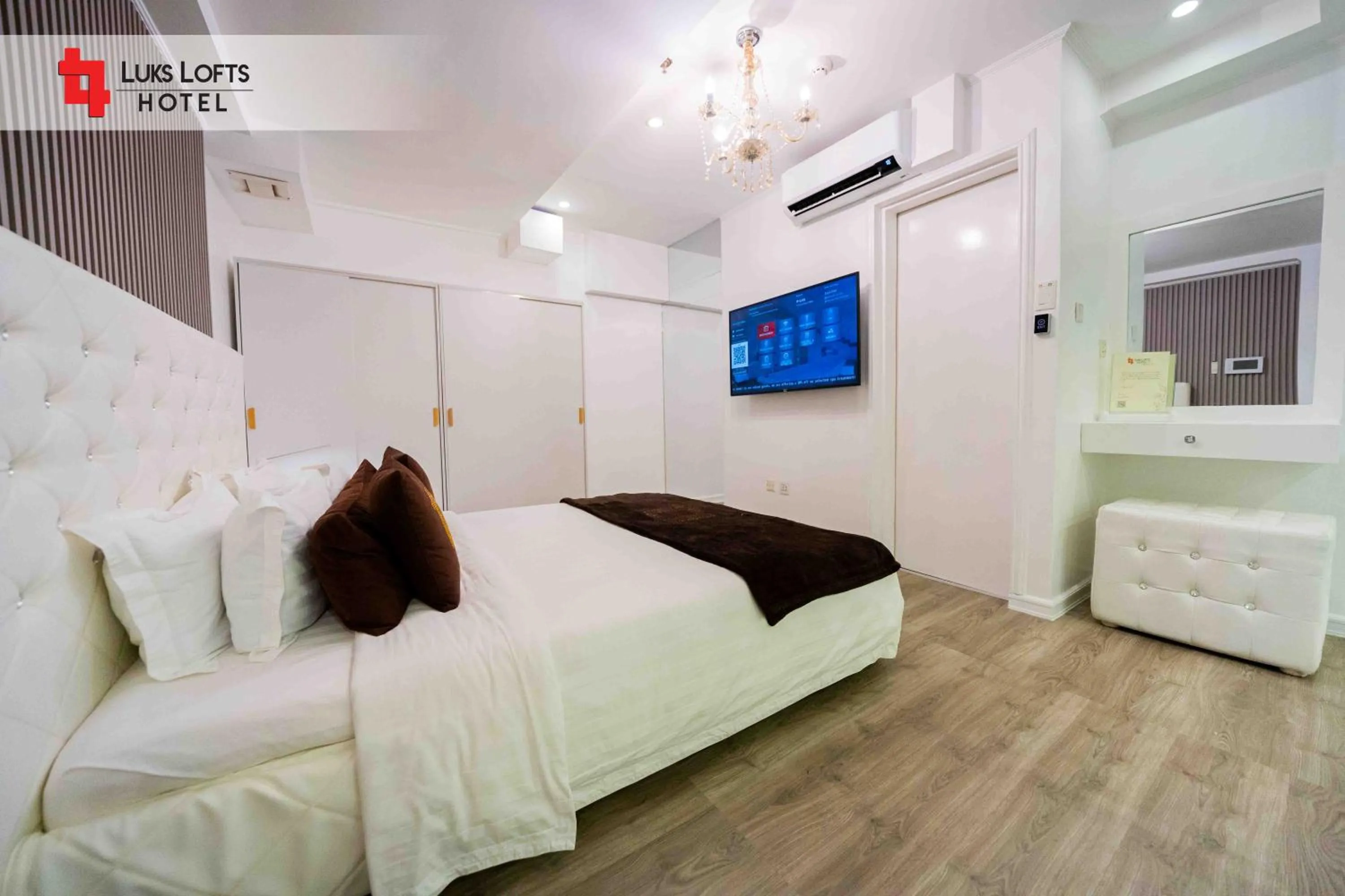 Bed in Luks Lofts Hotel & Residences