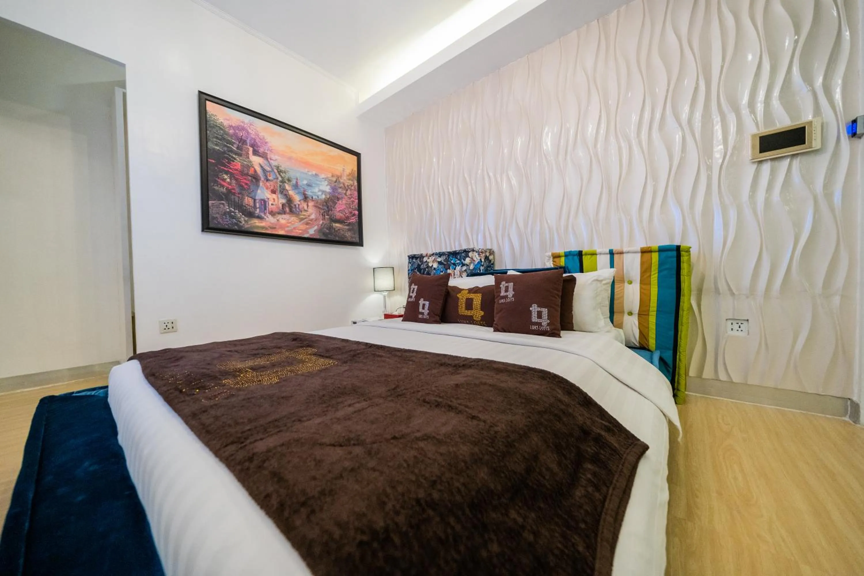 Bed in Luks Lofts Hotel & Residences