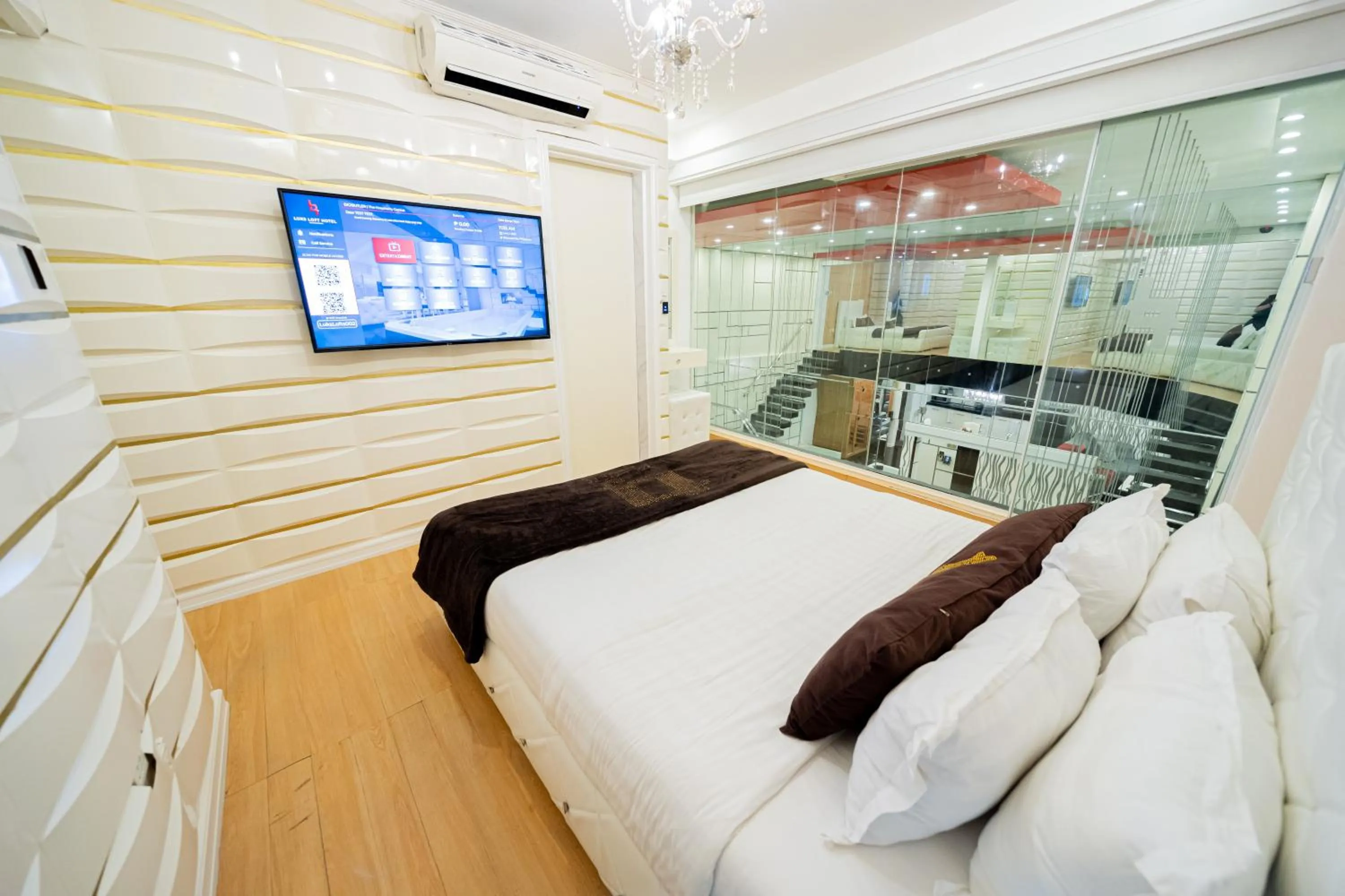 Bed in Luks Lofts Hotel & Residences