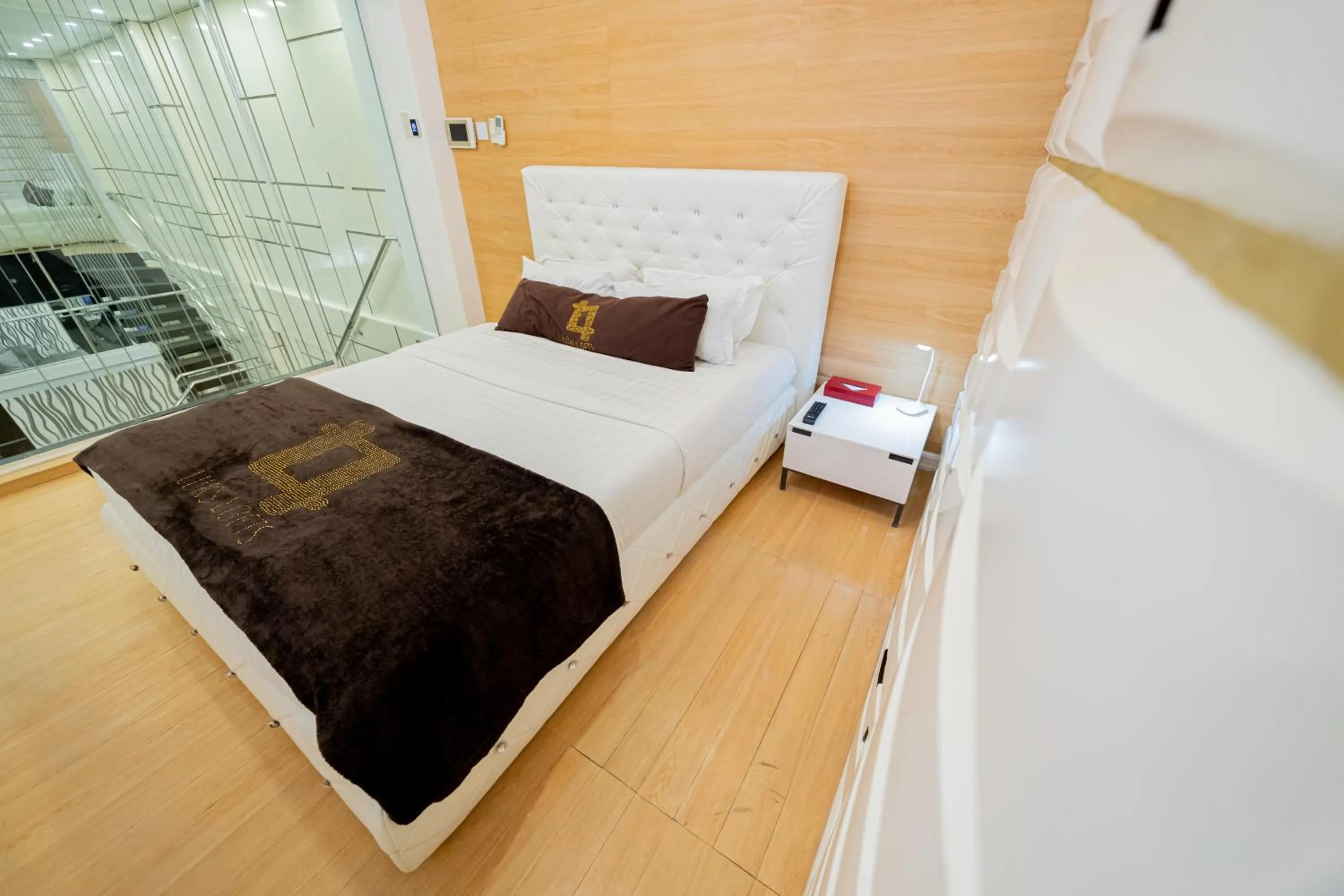 Bed in Luks Lofts Hotel & Residences