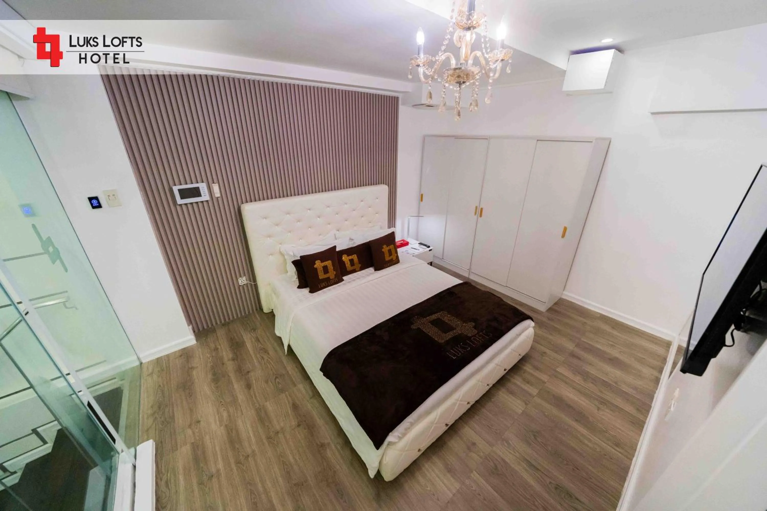 Bed in Luks Lofts Hotel & Residences