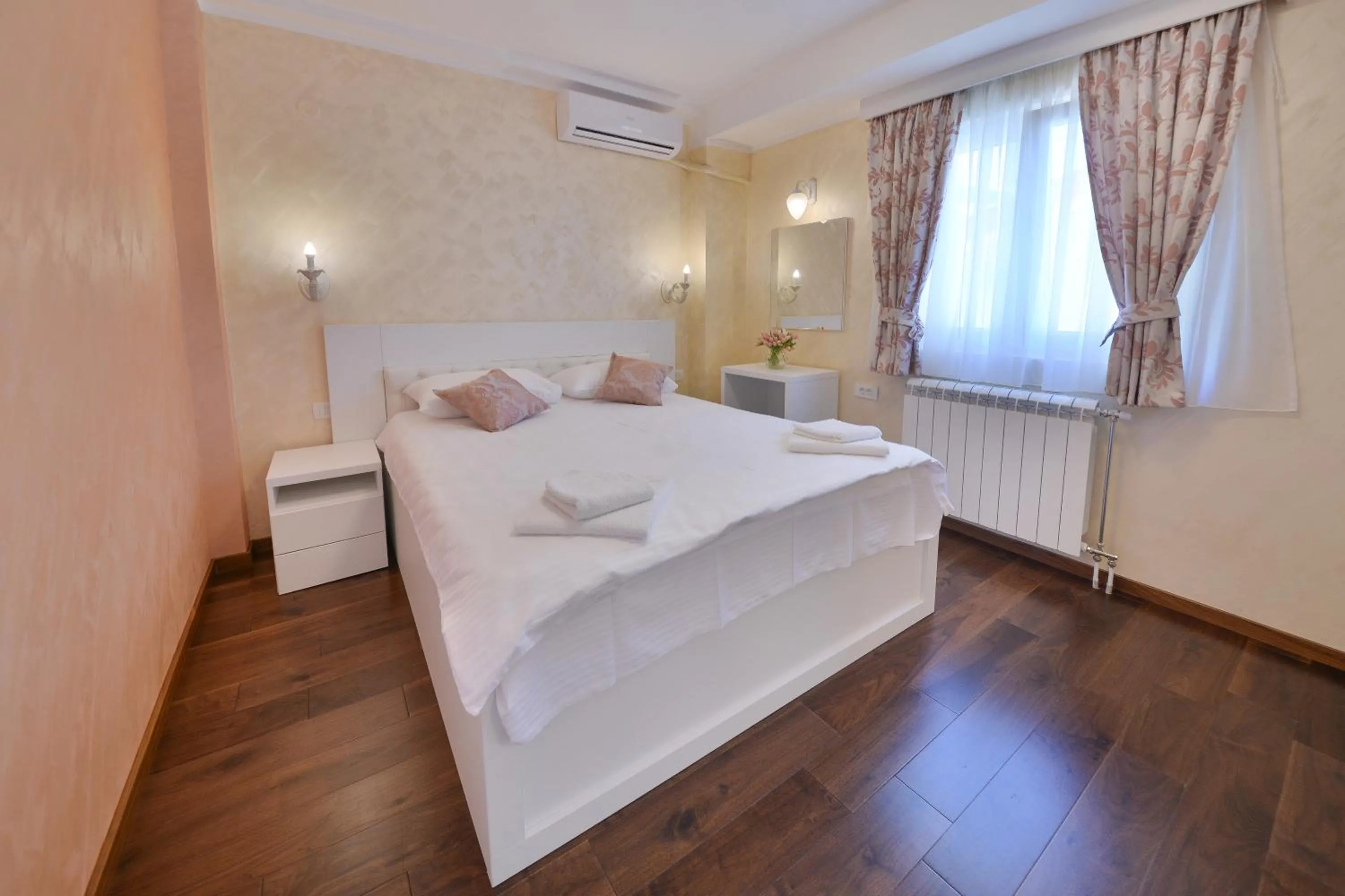 Bed in Aqua Breeze Apartments