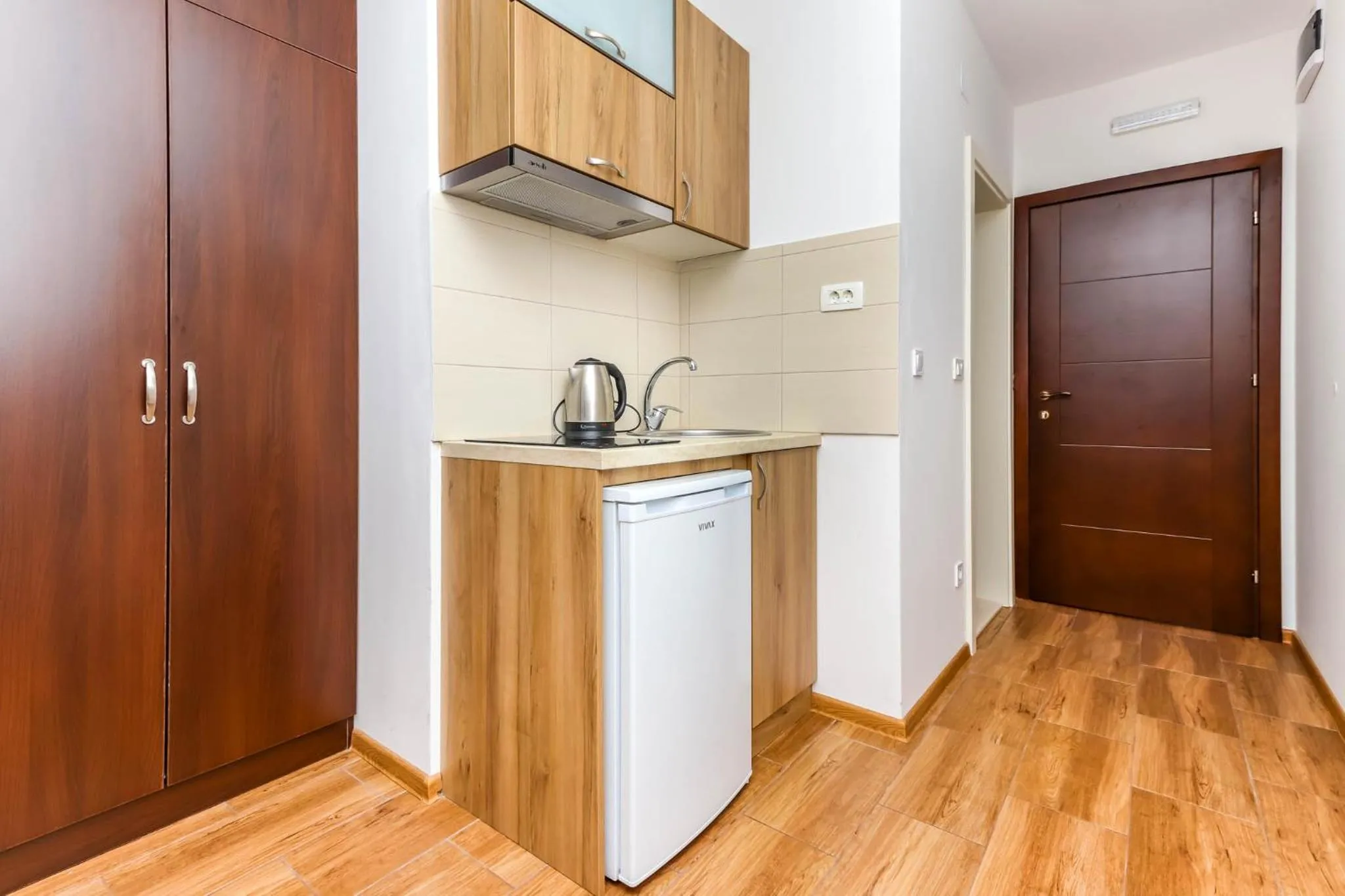 Kitchen or kitchenette in Aqua Breeze Apartments