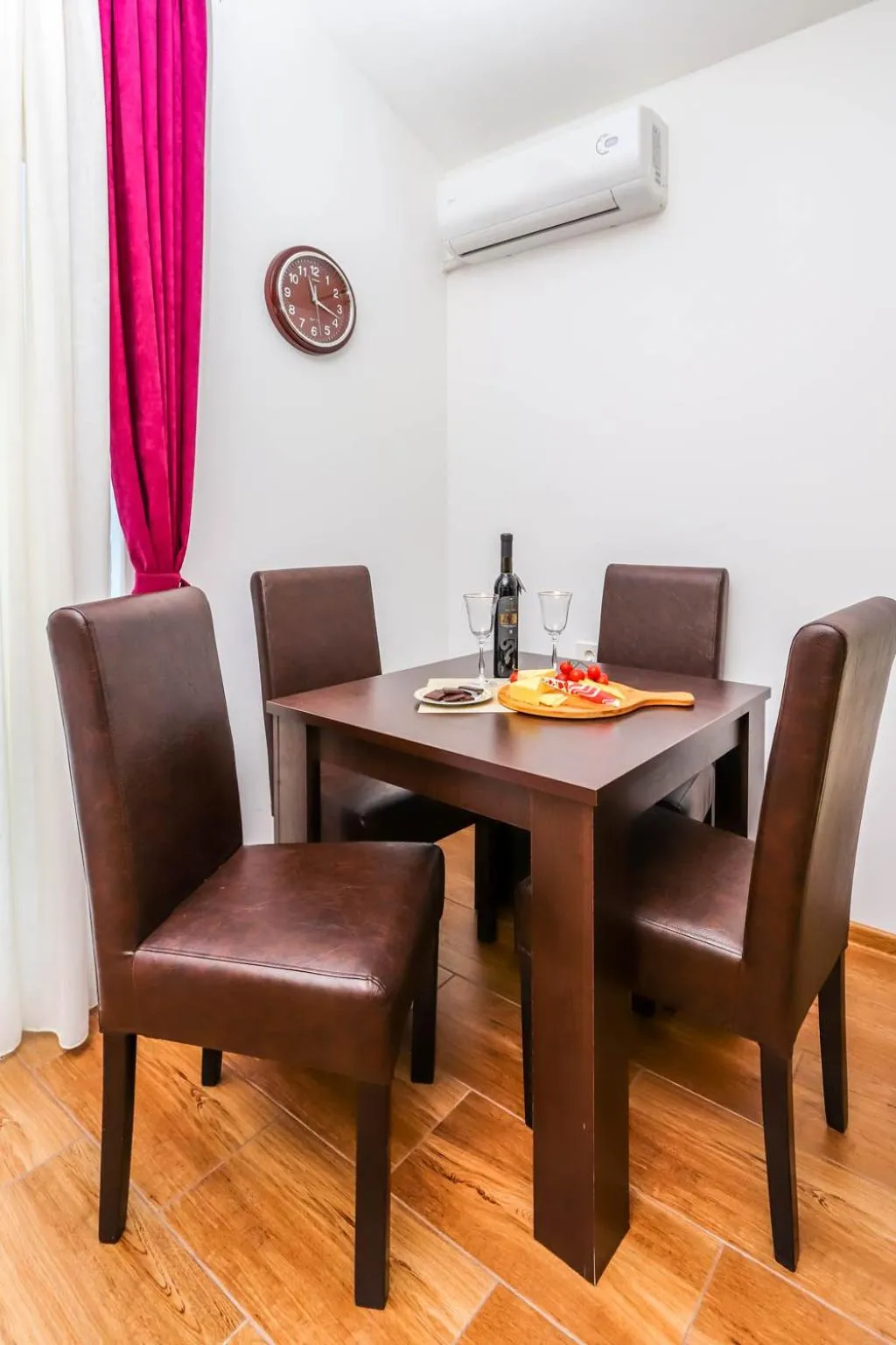 Dining area in Aqua Breeze Apartments