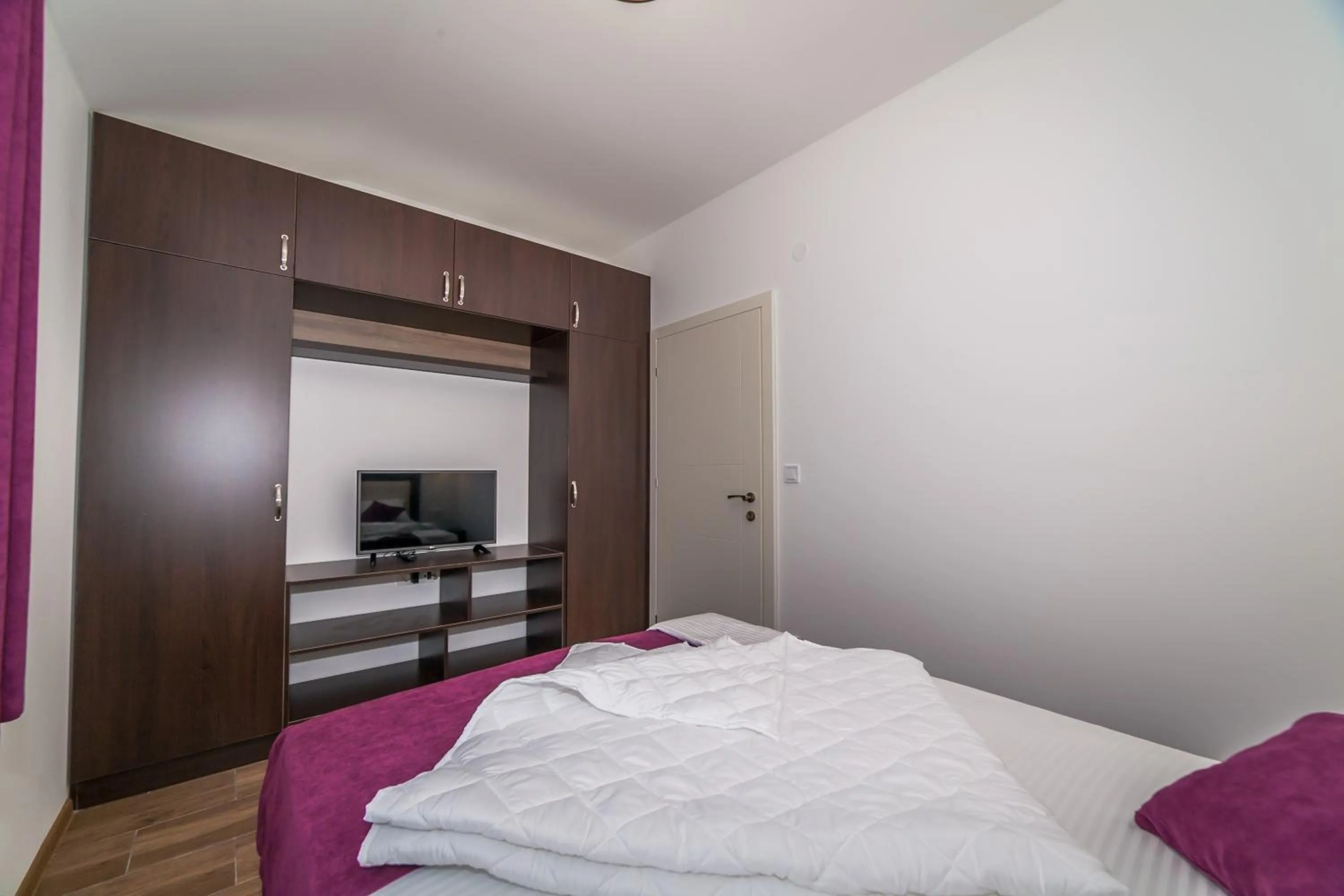 Bedroom, Bed in Aqua Breeze Apartments