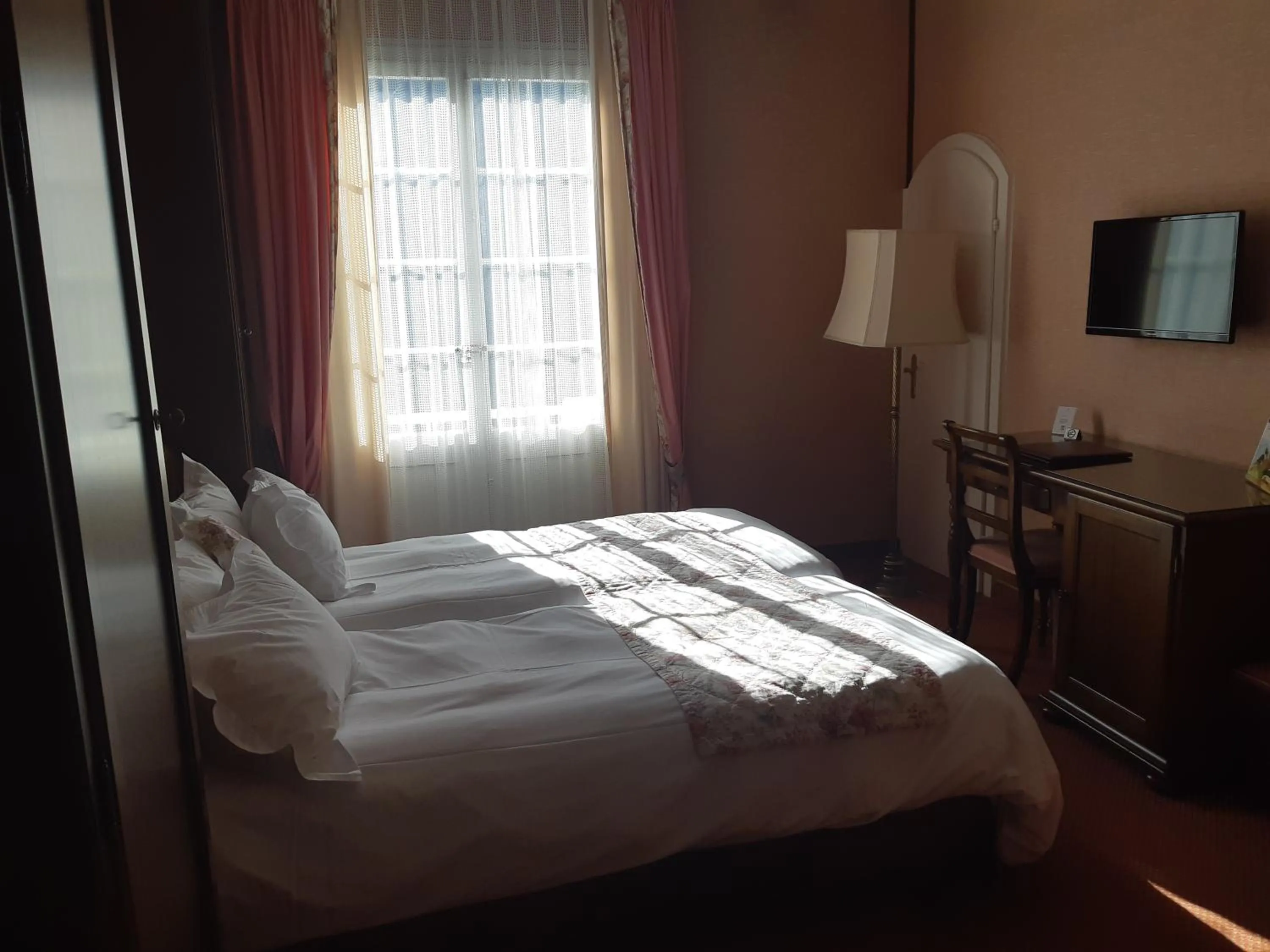 Photo of the whole room, Bed in Hotel Regina