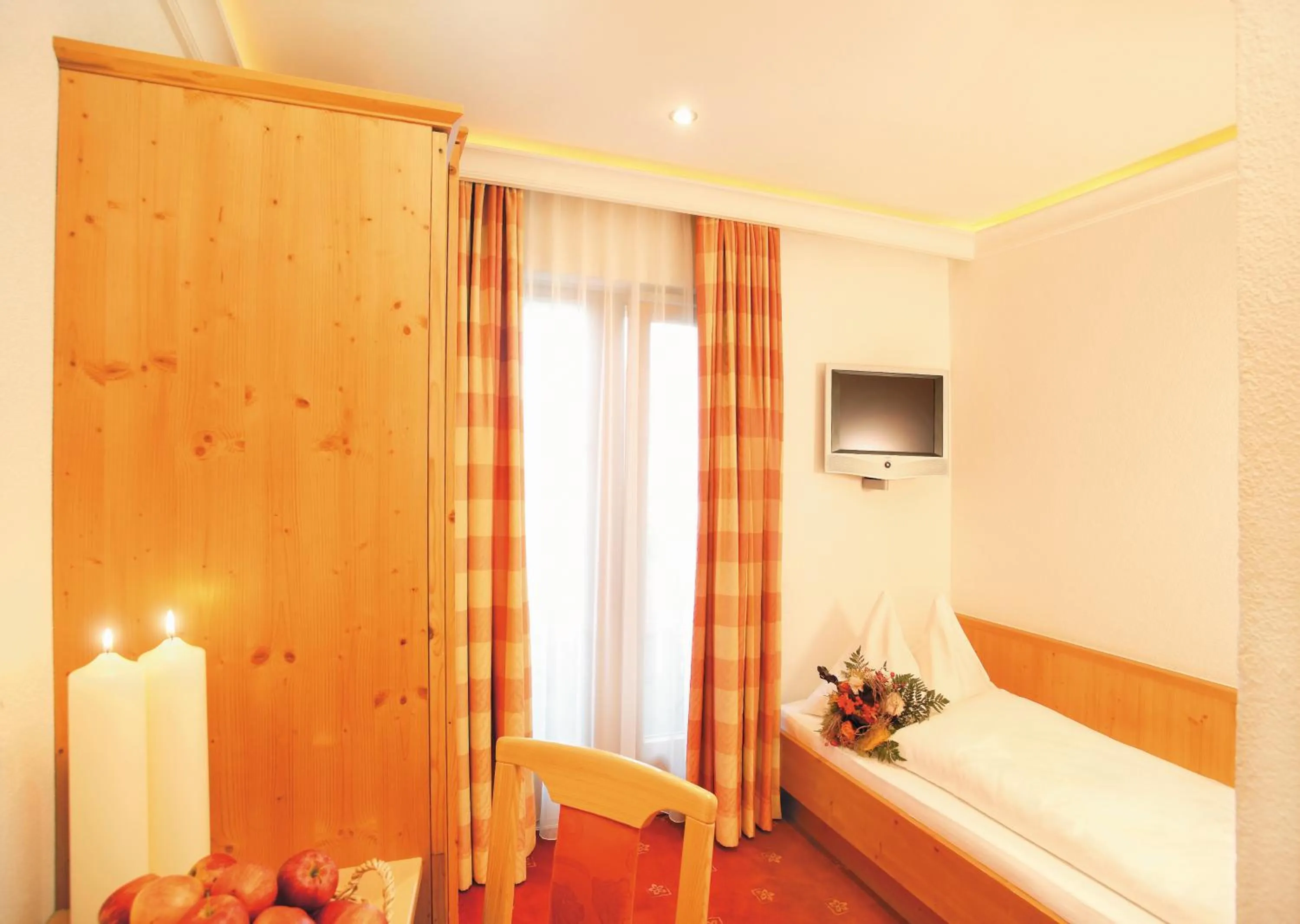 Photo of the whole room, Bed in Samnaunerhof Vital-Hotel