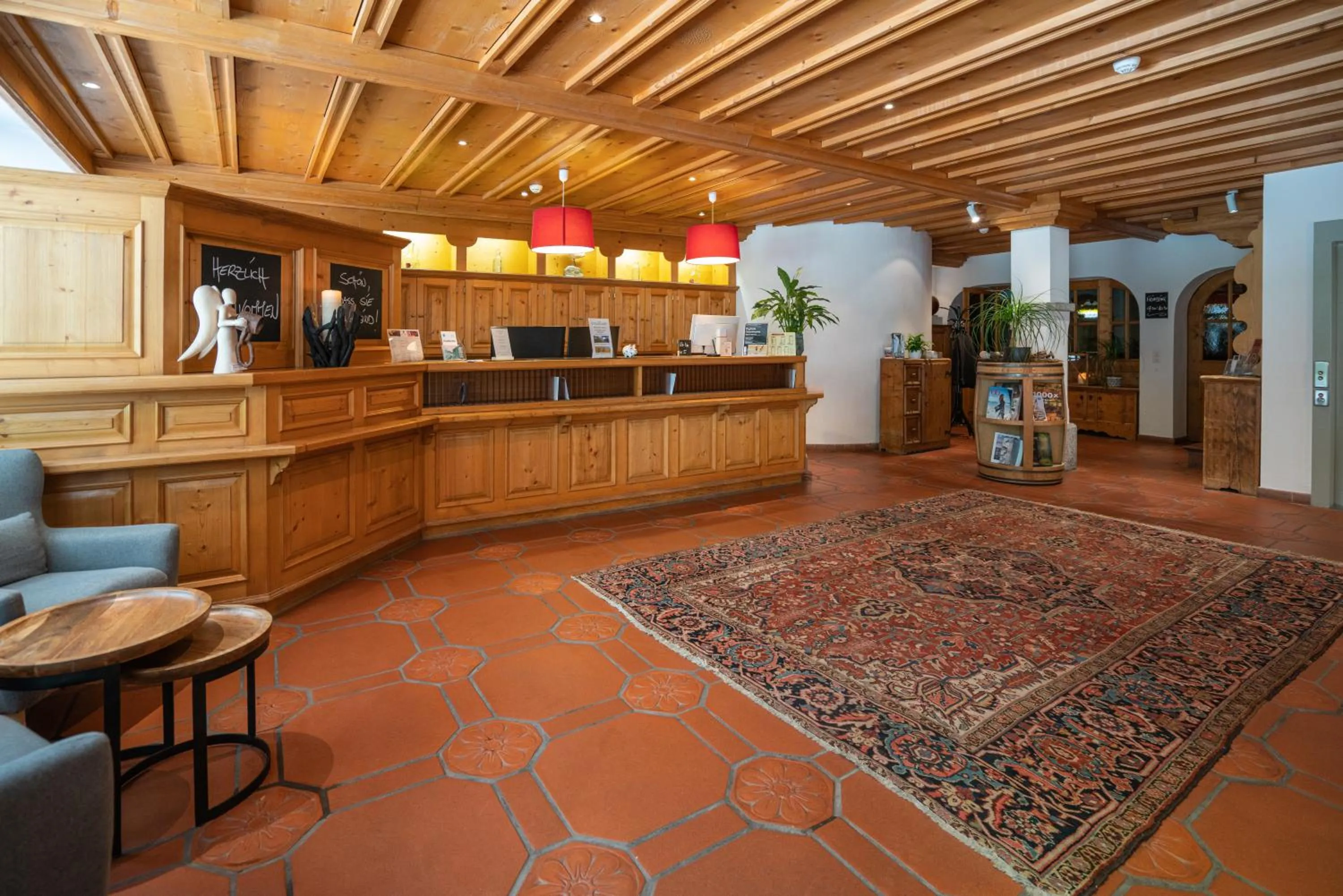 Lobby or reception in Hotel des Alpes