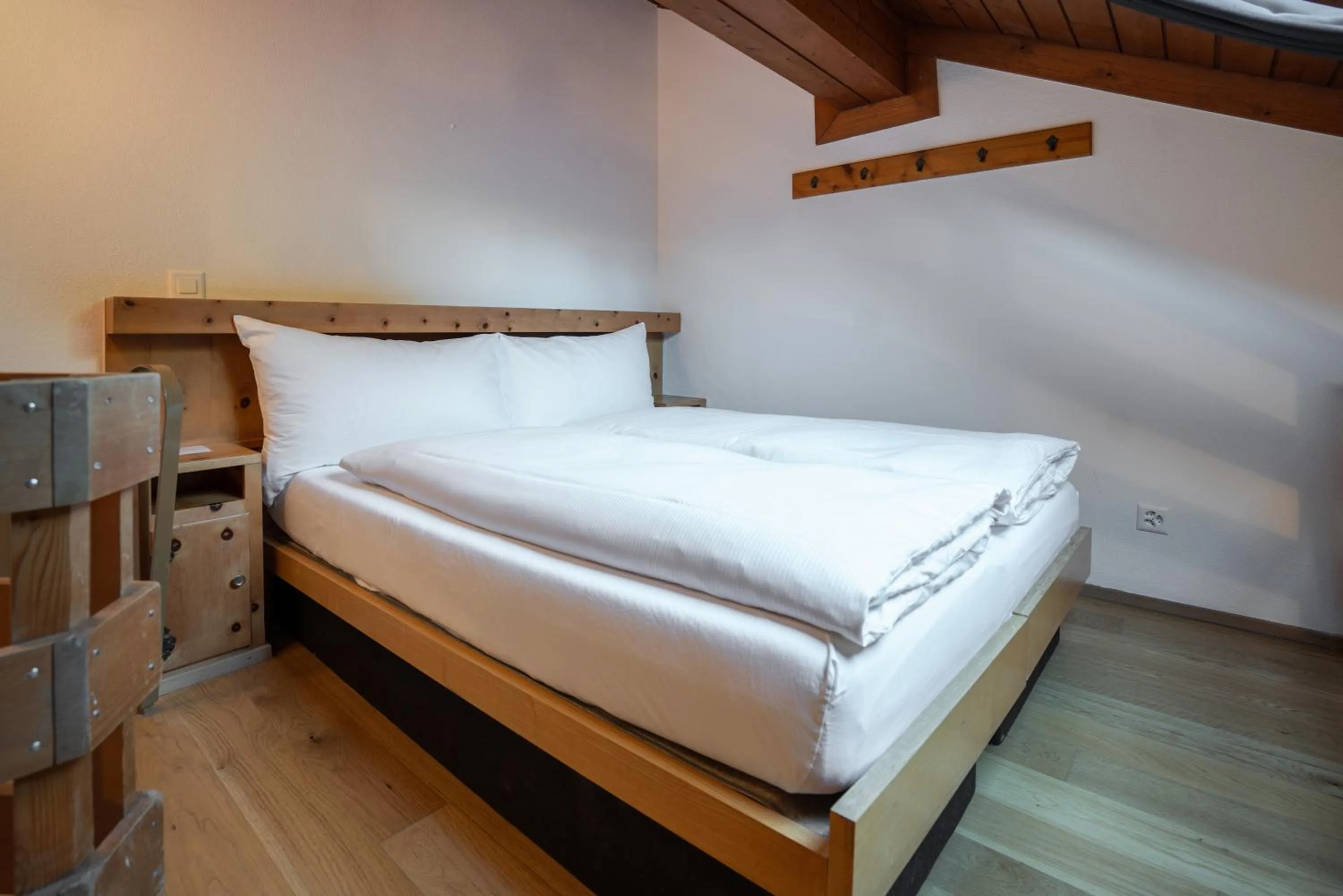 Bed in Hotel des Alpes